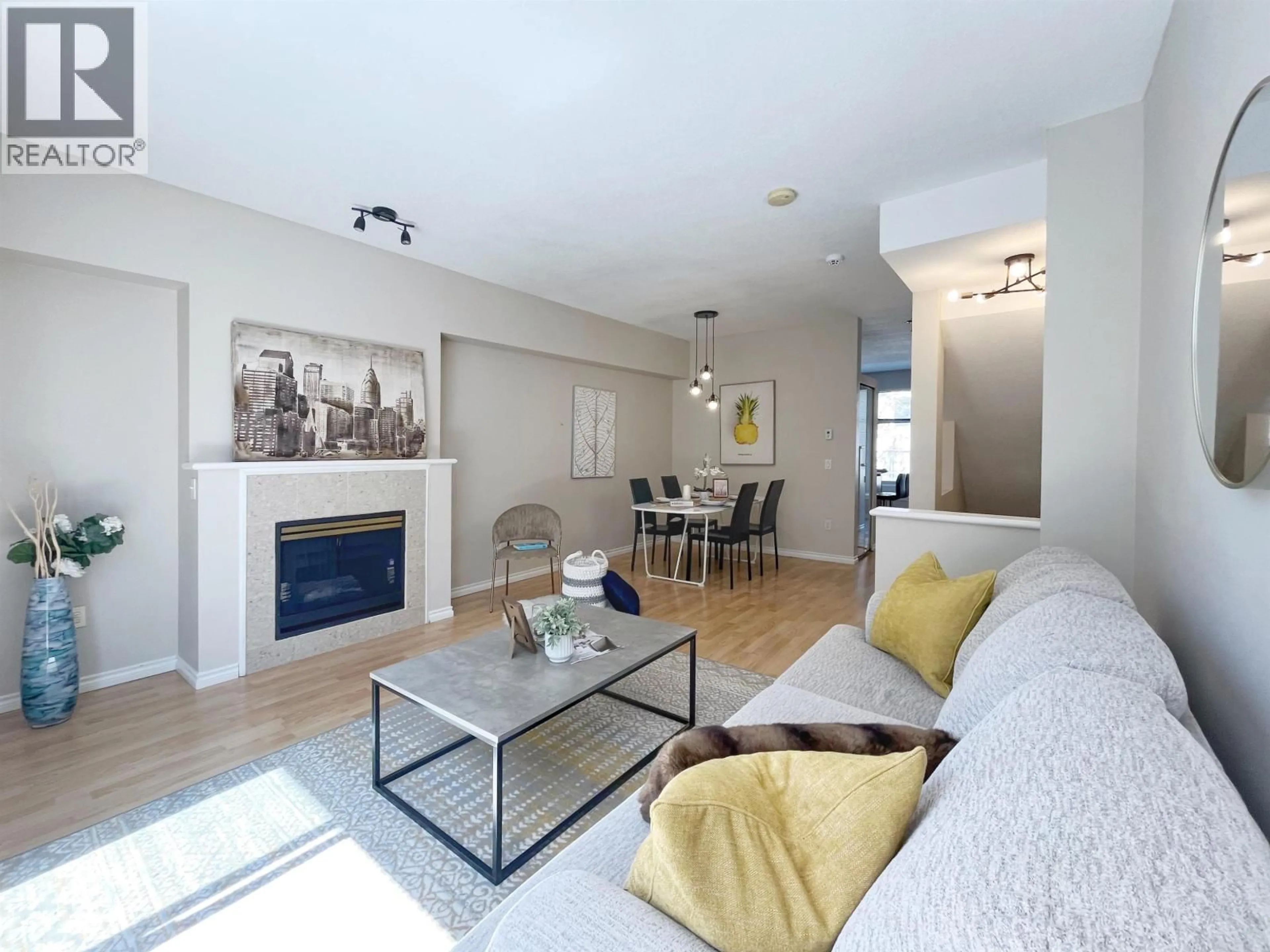 Living room with furniture, wood/laminate floor for 78 - 6588 BARNARD DRIVE, Richmond British Columbia V7C5R8