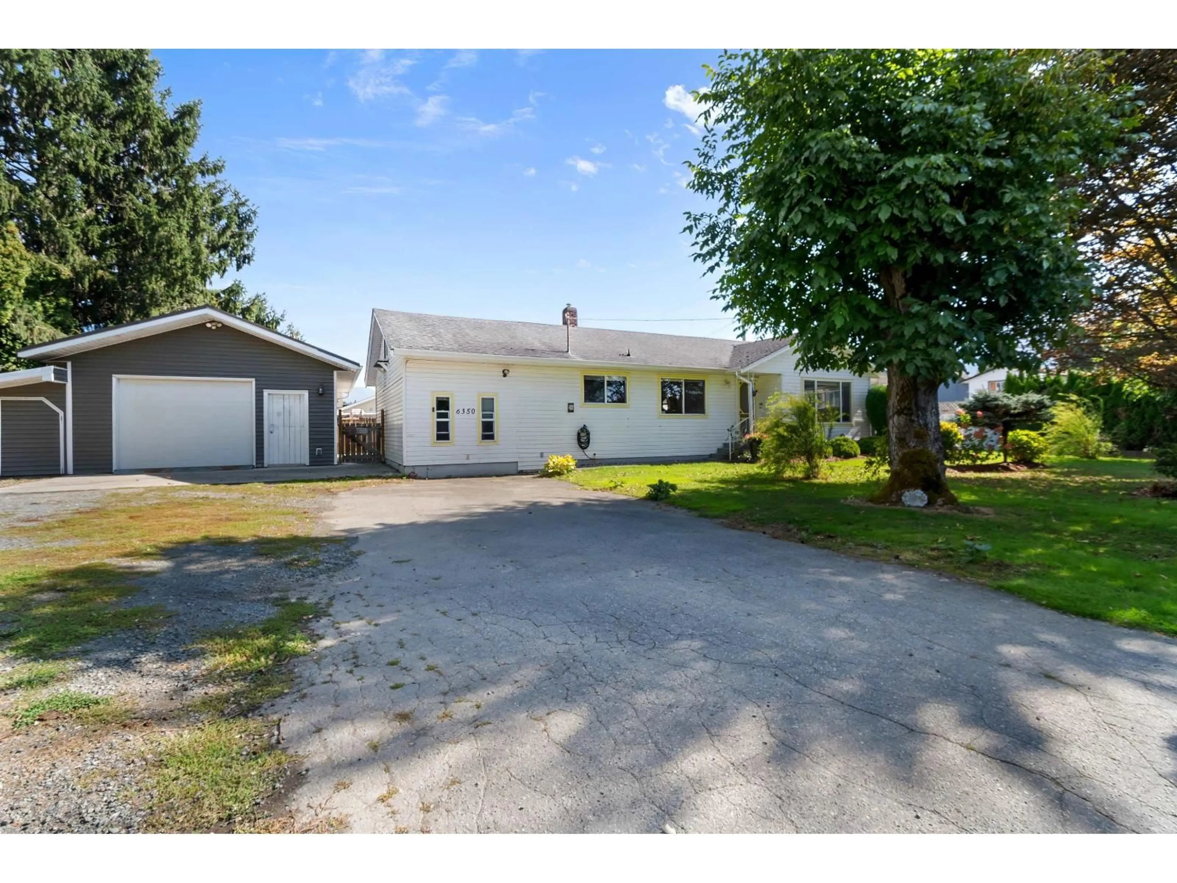 A pic from outside/outdoor area/front of a property/back of a property/a pic from drone, street for 6350 SUMAS PRAIRIE ROAD, Sardis - Greendale British Columbia V2R4N6