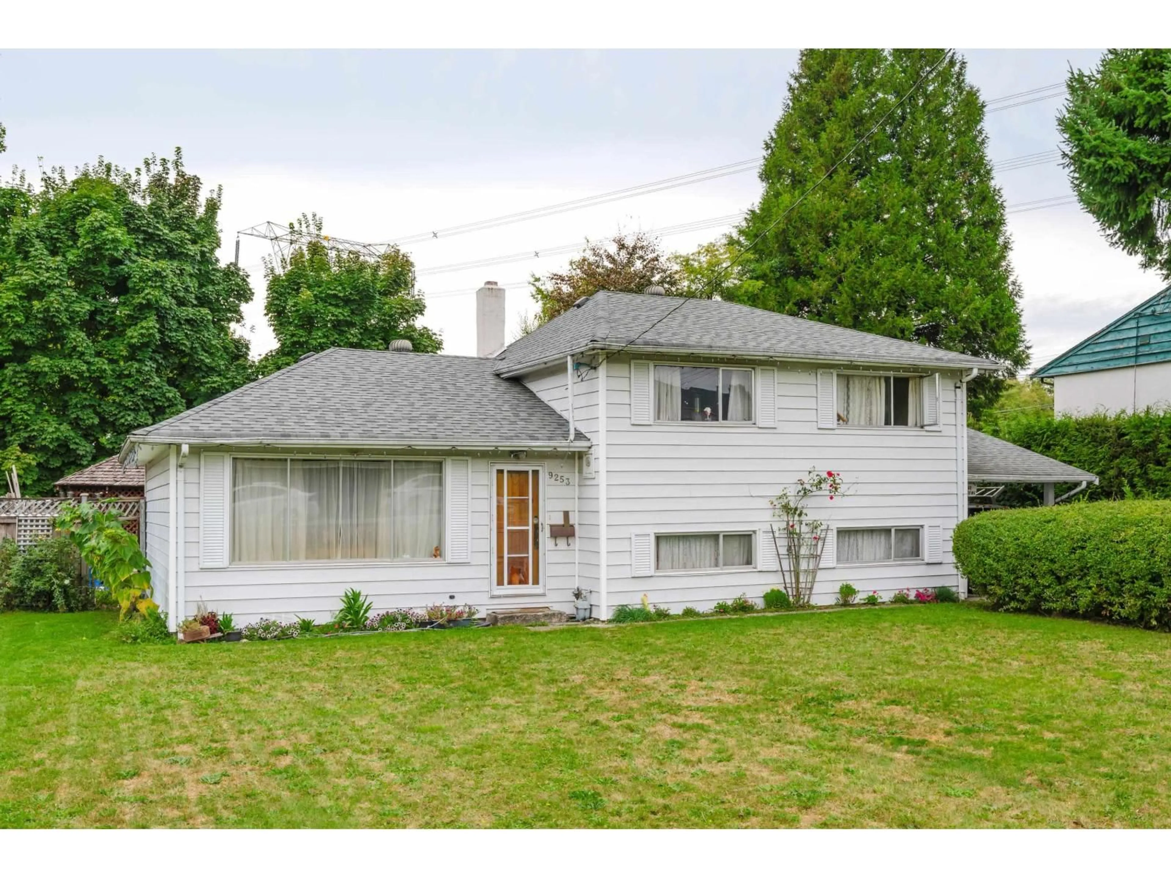 Home with vinyl exterior material, street for 9253 137A STREET, Surrey British Columbia V3V5W8