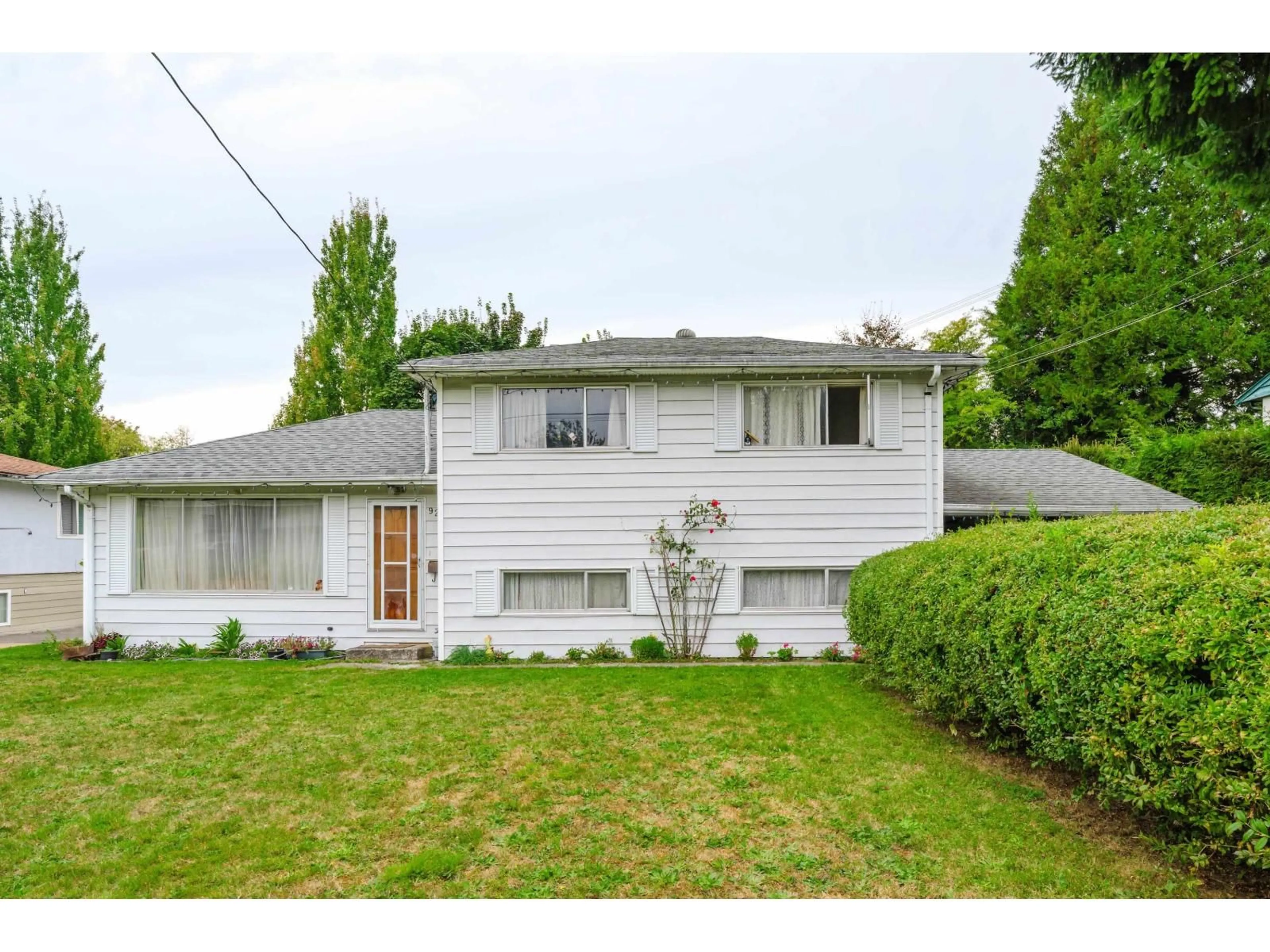 Home with vinyl exterior material, street for 9253 137A STREET, Surrey British Columbia V3V5W8
