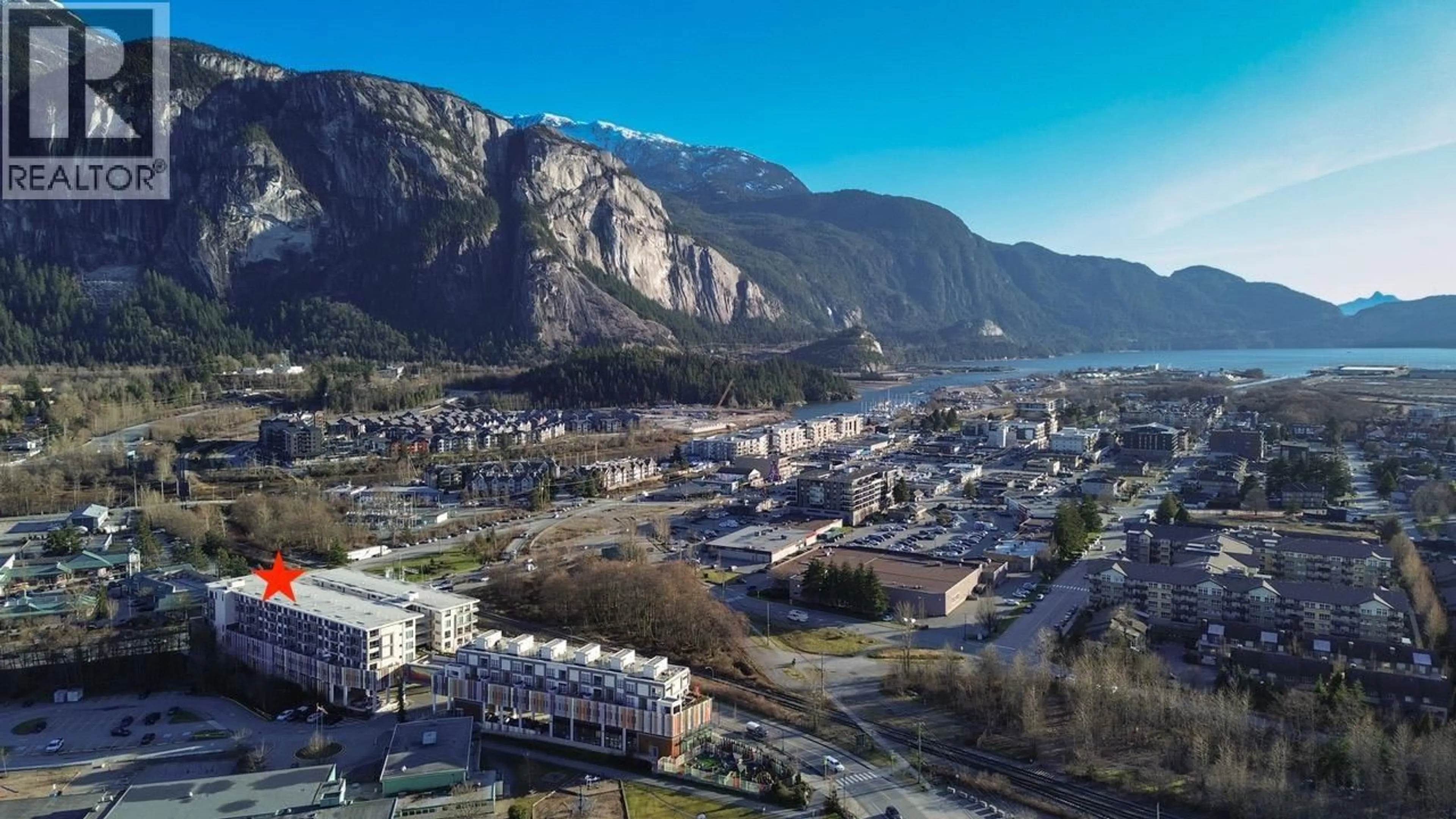 A pic from outside/outdoor area/front of a property/back of a property/a pic from drone, mountain view for 712 - 38362 BUCKLEY AVENUE, Squamish British Columbia V8B0J8