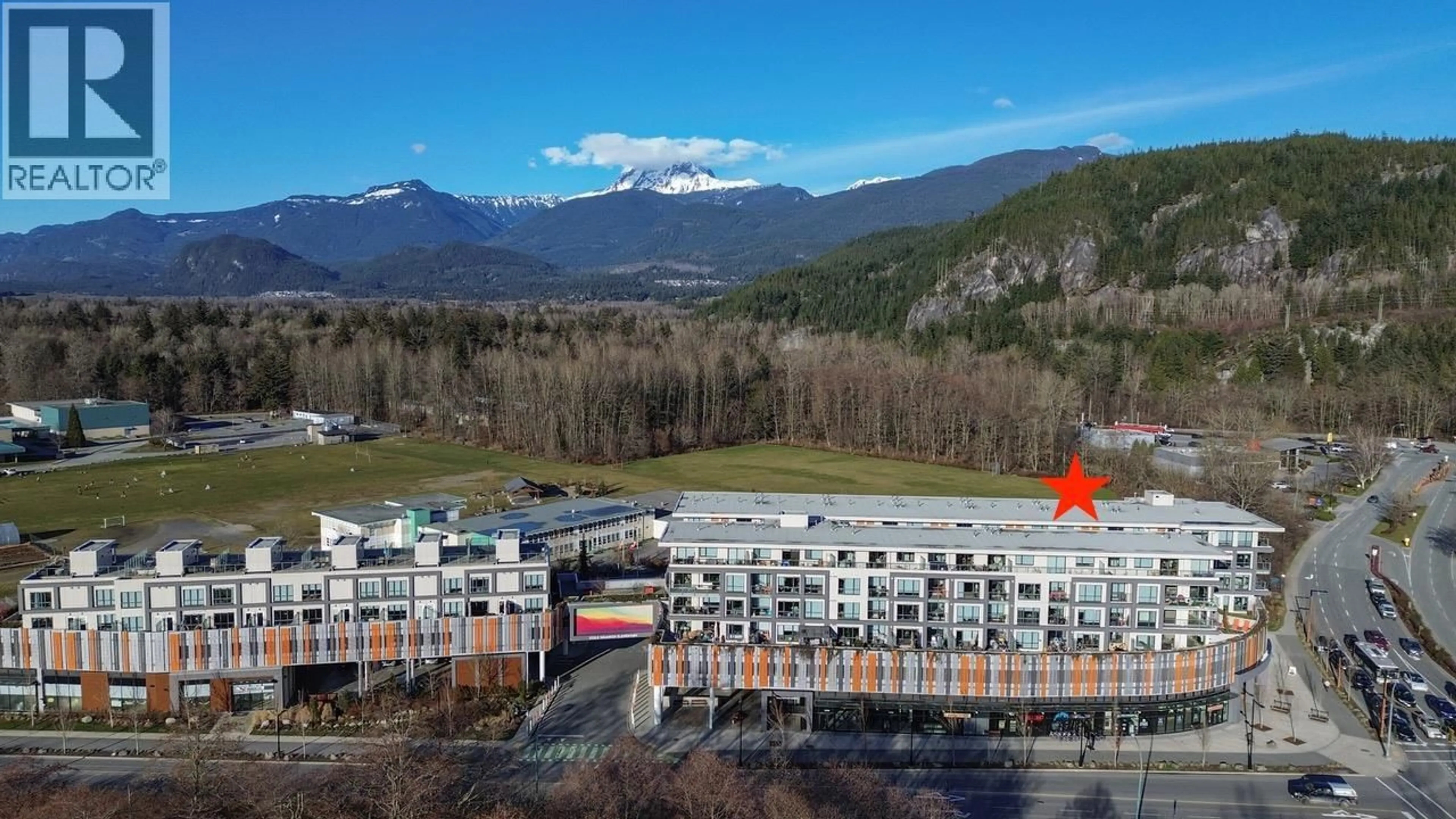 A pic from outside/outdoor area/front of a property/back of a property/a pic from drone, mountain view for 712 - 38362 BUCKLEY AVENUE, Squamish British Columbia V8B0J8