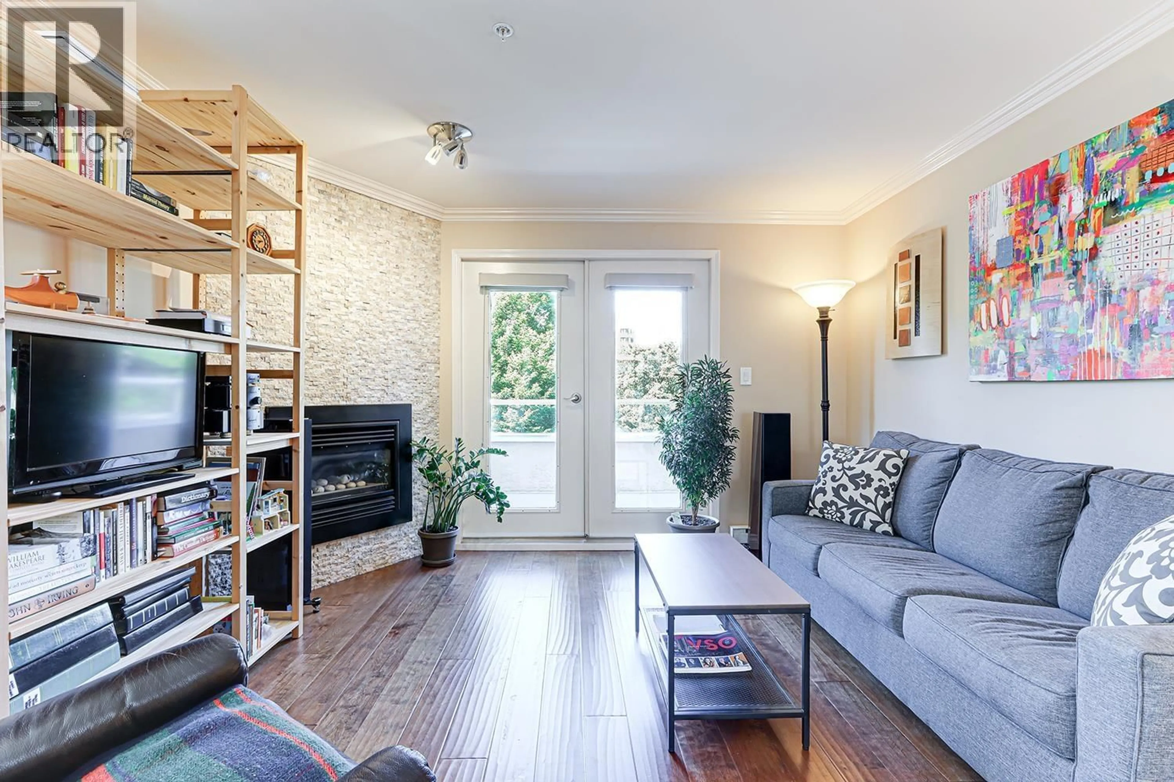 Living room with furniture, wood/laminate floor for 5 - 890 BROUGHTON STREET, Vancouver British Columbia V6G2A2