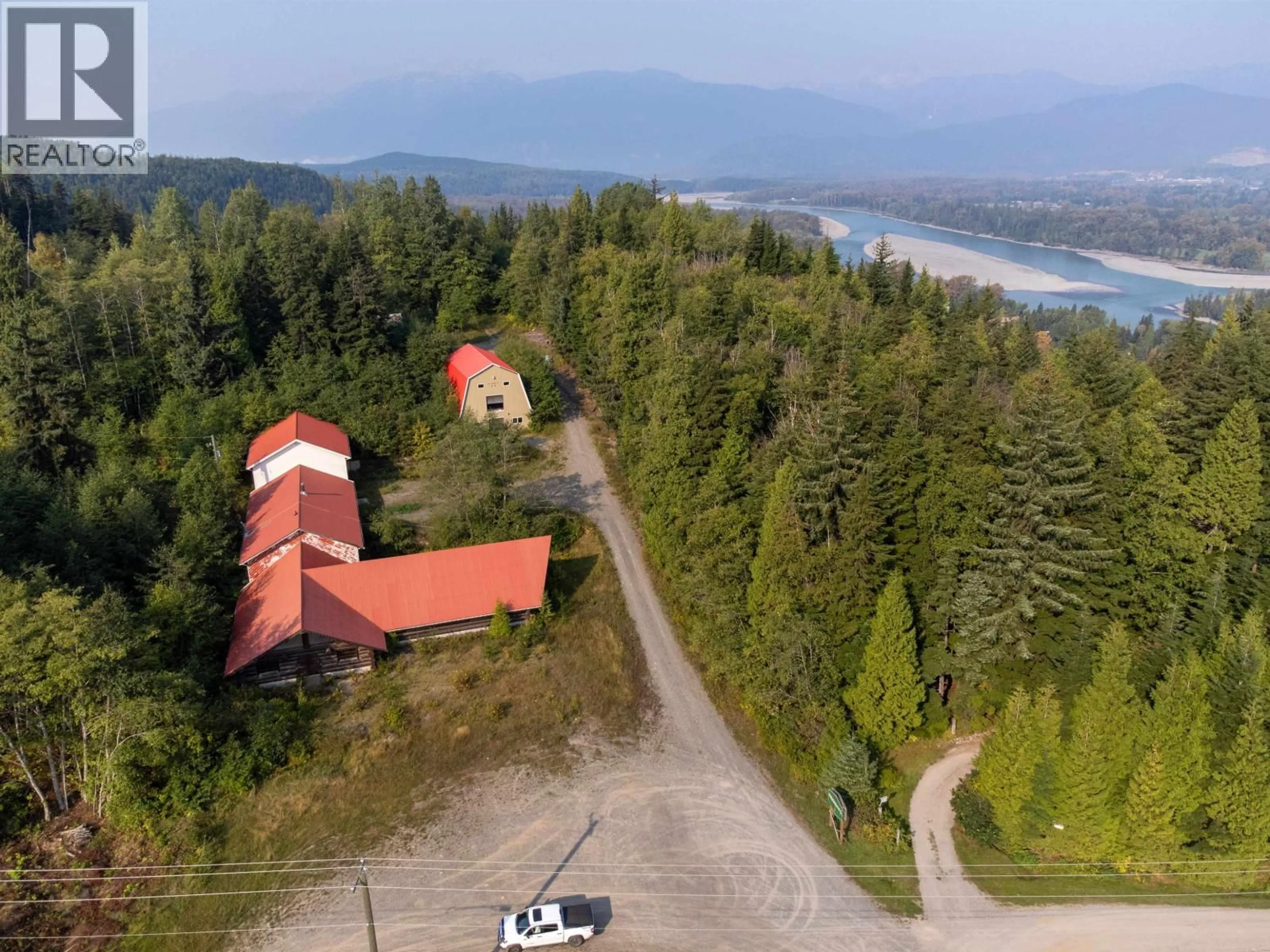 A pic from outside/outdoor area/front of a property/back of a property/a pic from drone, mountain view for 5453 37 HIGHWAY, Terrace British Columbia V8G3Y4