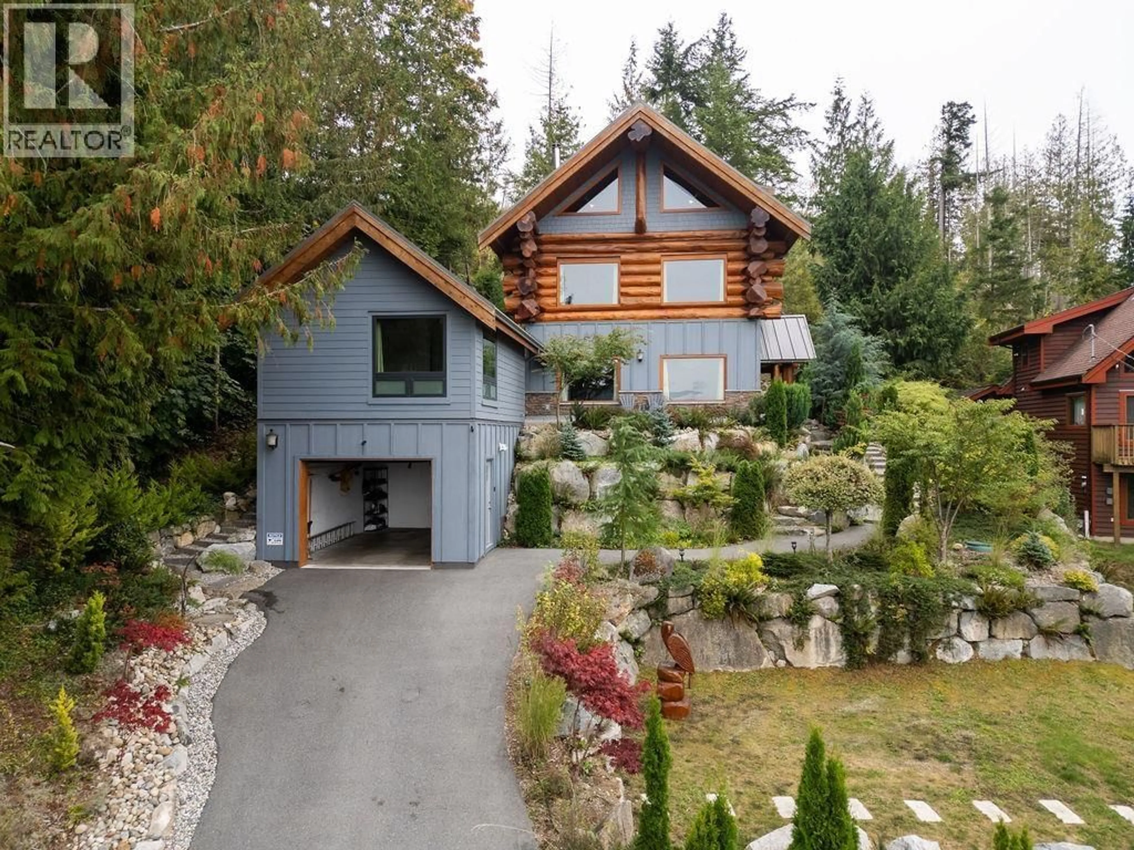 A pic from outside/outdoor area/front of a property/back of a property/a pic from drone, unknown for 5895 SKOOKUMCHUK ROAD, Sechelt British Columbia V7Z0E1