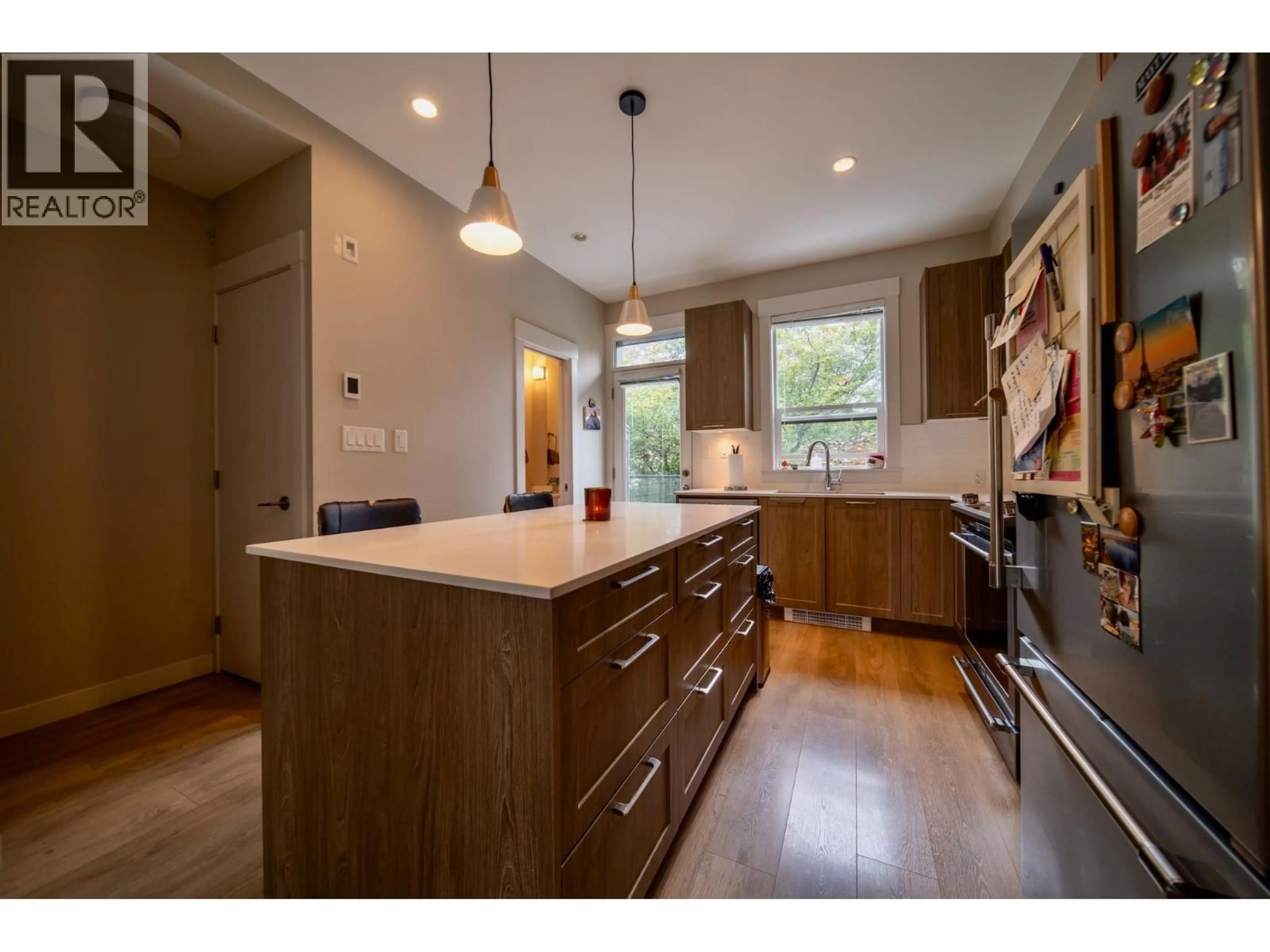 Open concept kitchen, wood/laminate floor for 21 - 38684 BUCKLEY AVENUE, Squamish British Columbia V8B0M4