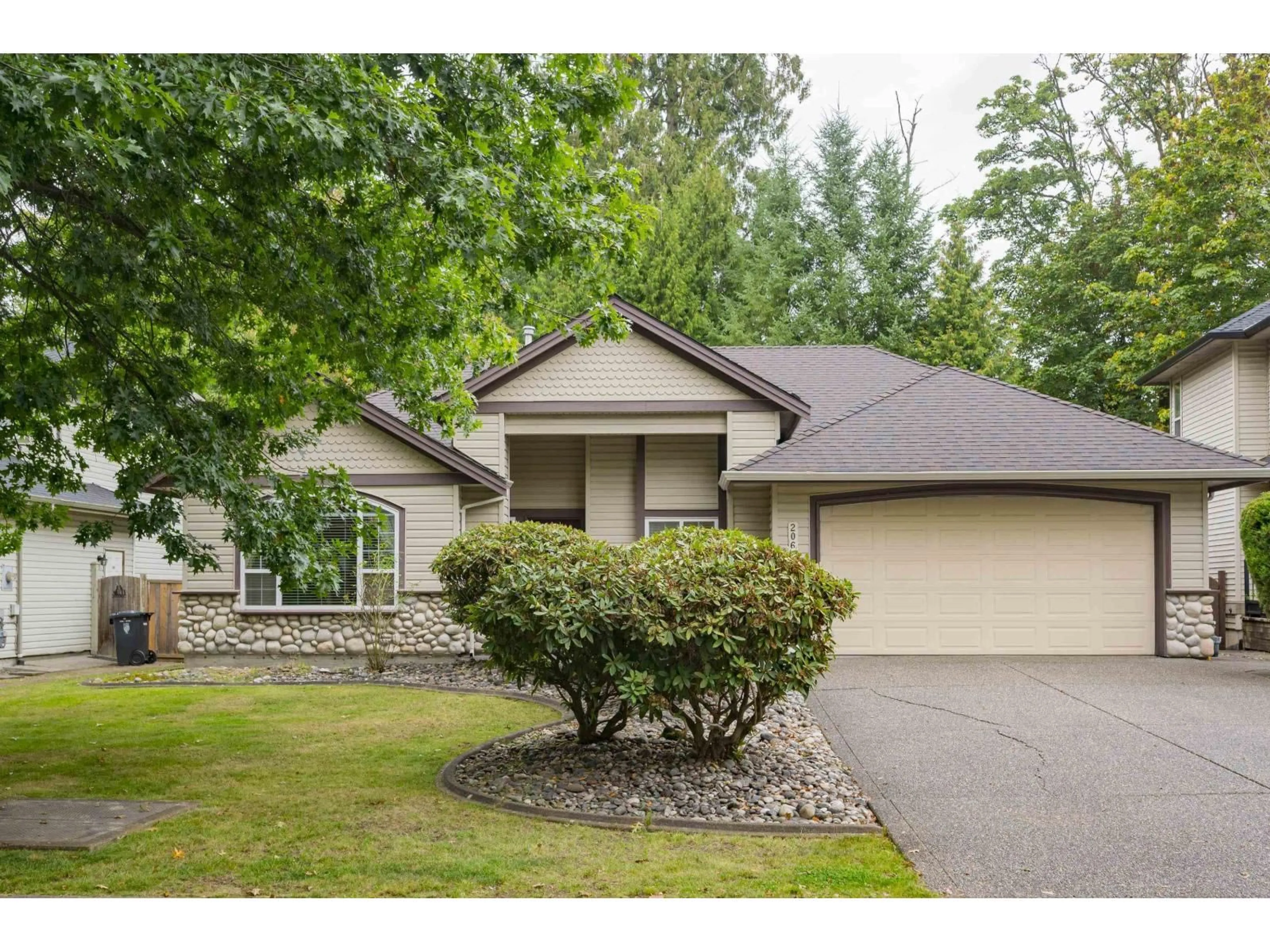 Home with vinyl exterior material, street for 20675 97B, Langley British Columbia V1M3Y3