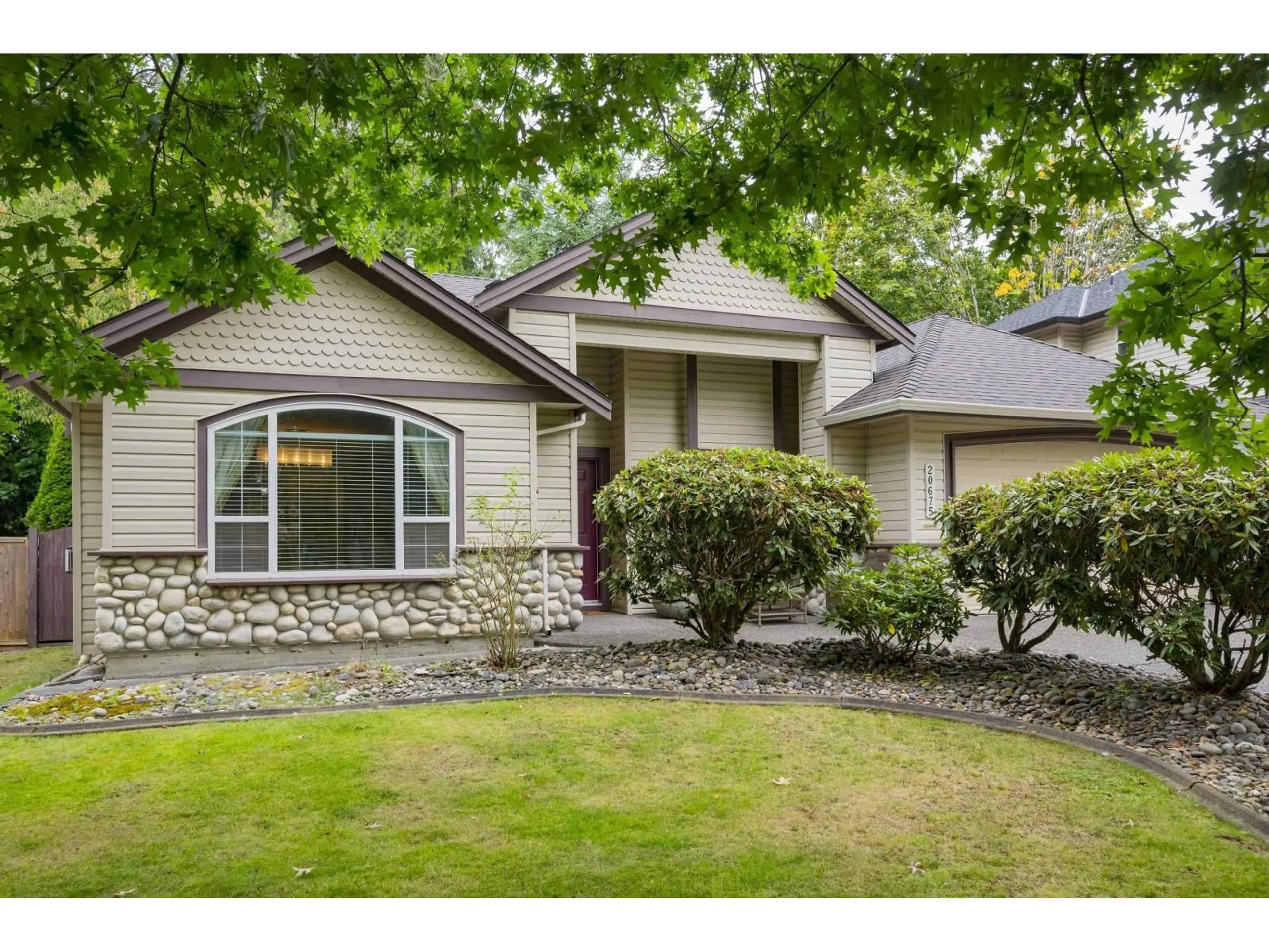Home with vinyl exterior material, street for 20675 97B, Langley British Columbia V1M3Y3