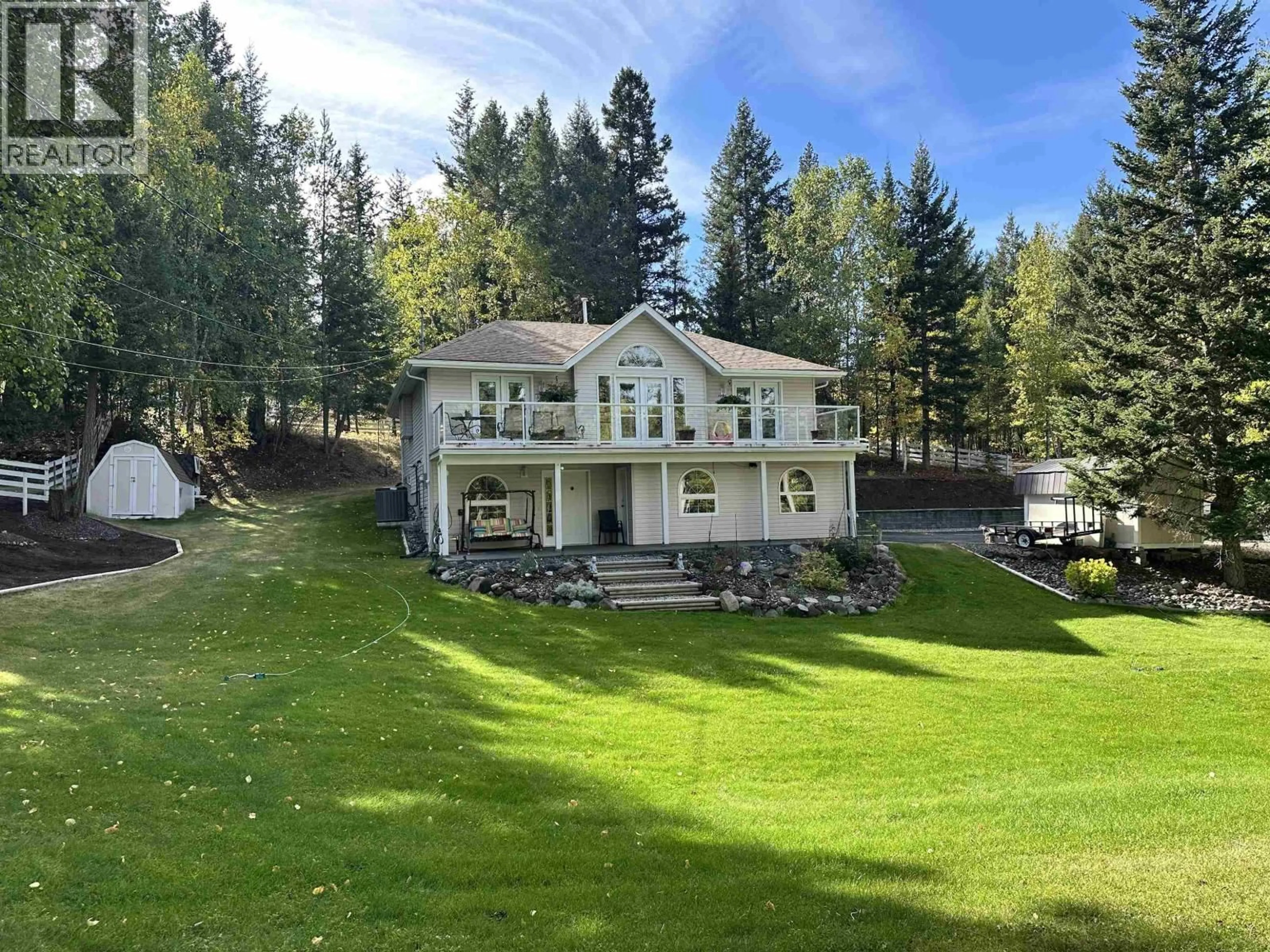 A pic from outside/outdoor area/front of a property/back of a property/a pic from drone, unknown for 5236 KALLUM DRIVE, 108 Mile Ranch British Columbia V0K2Z0