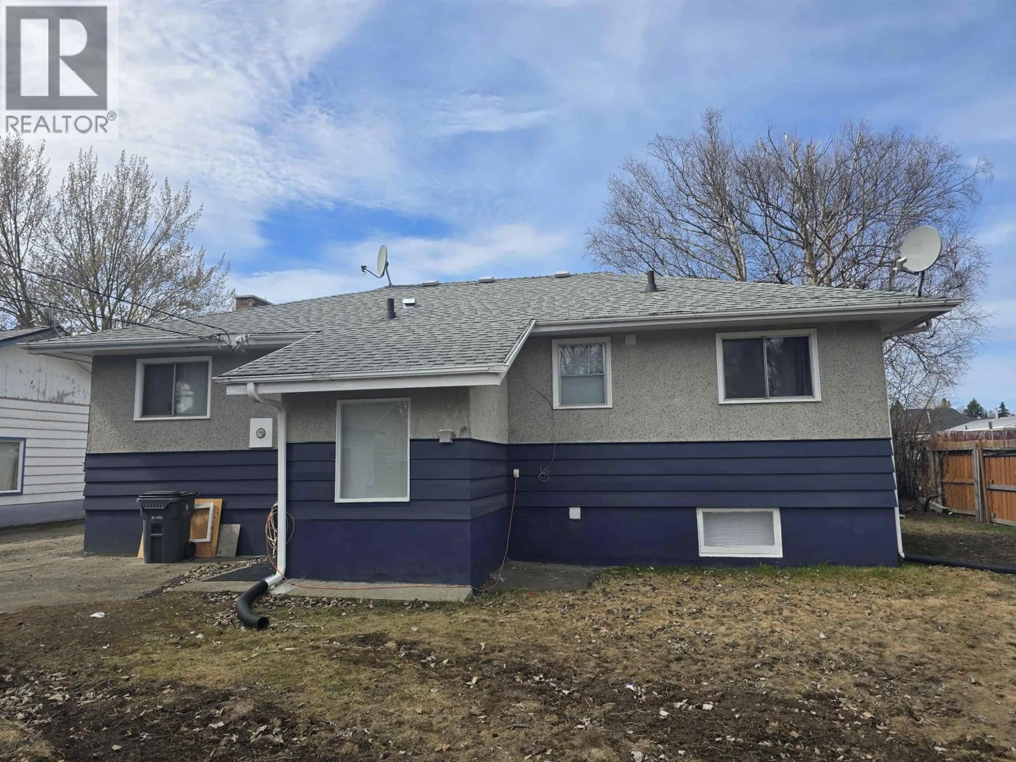 Home with vinyl exterior material, street for 1542 CARNEY STREET, Prince George British Columbia V2M2L5