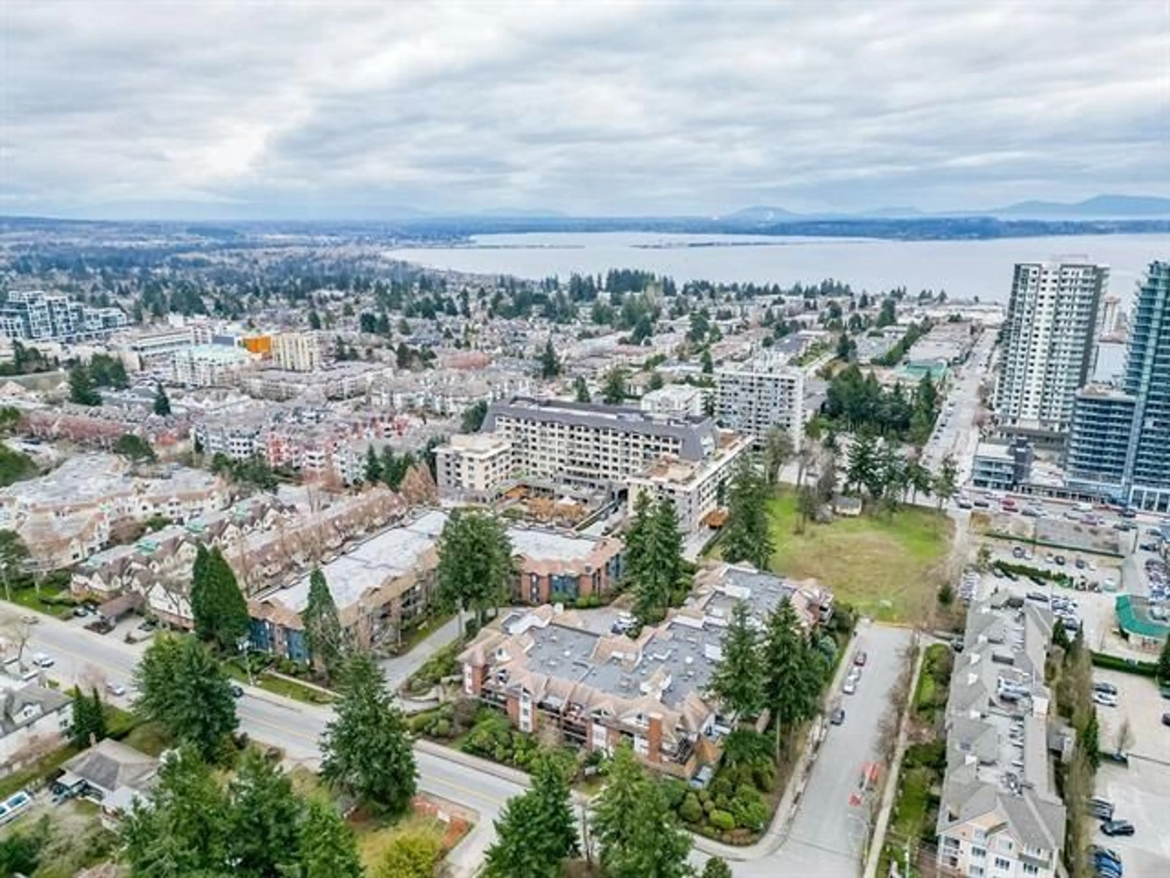A pic from outside/outdoor area/front of a property/back of a property/a pic from drone, unknown for 107 - 15300 17, Surrey British Columbia V4A8Y6