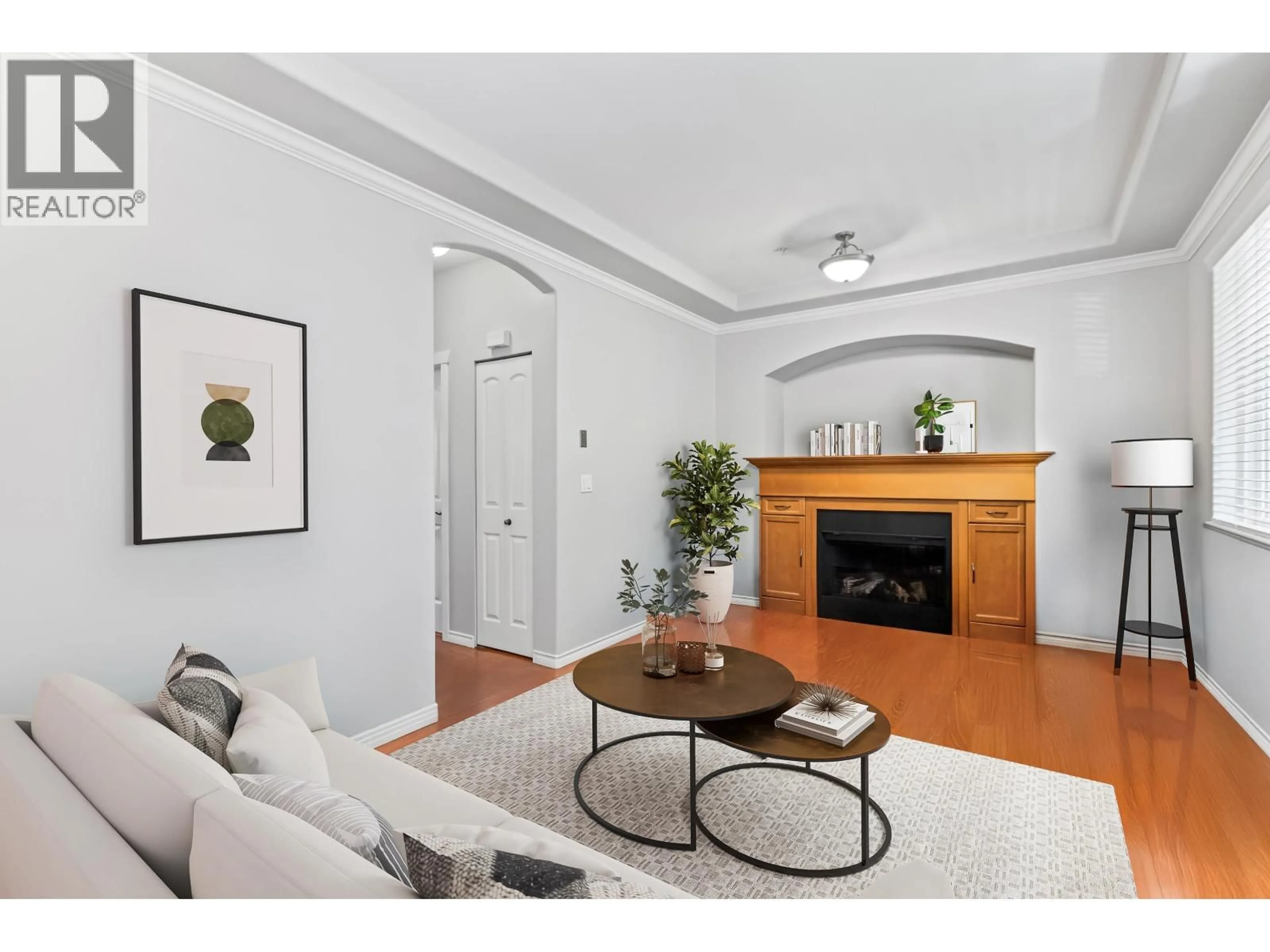 Living room with furniture, wood/laminate floor for 13 - 19063 MCMYN ROAD, Pitt Meadows British Columbia V3Y2W5