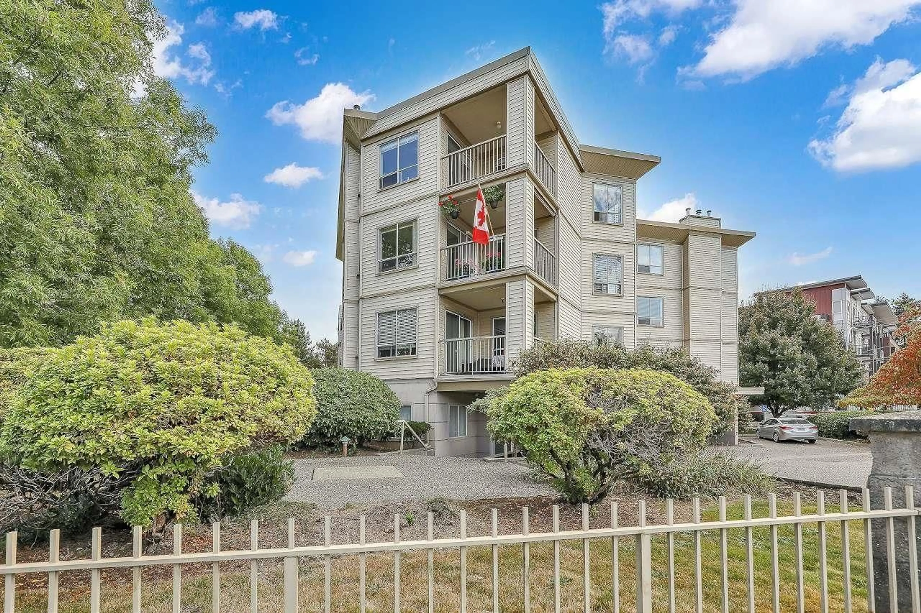 A pic from outside/outdoor area/front of a property/back of a property/a pic from drone, building for 201 - 5450 208, Langley British Columbia V3A2J9