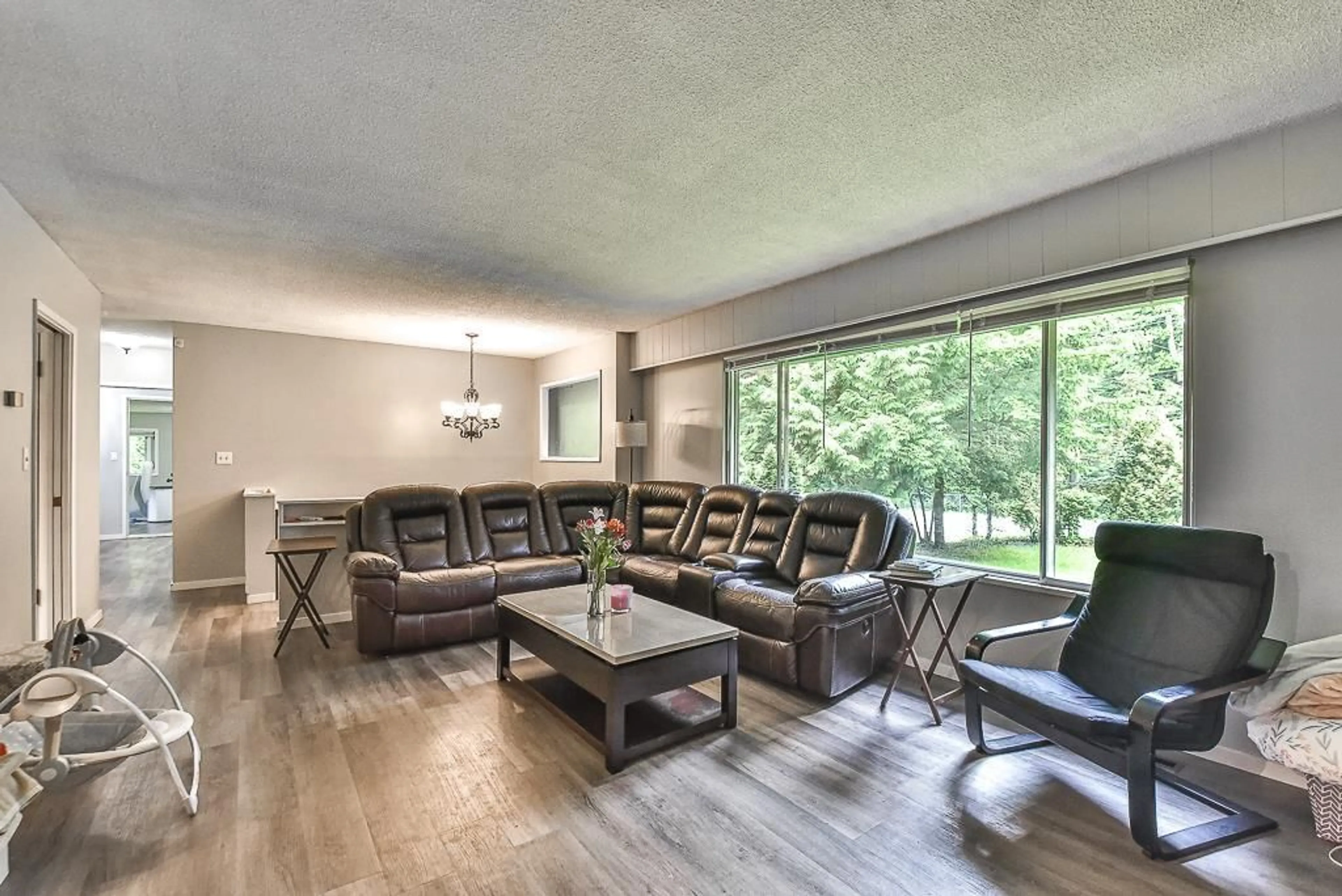 Living room with furniture, wood/laminate floor for 5505 248, Langley British Columbia V2Z2P1