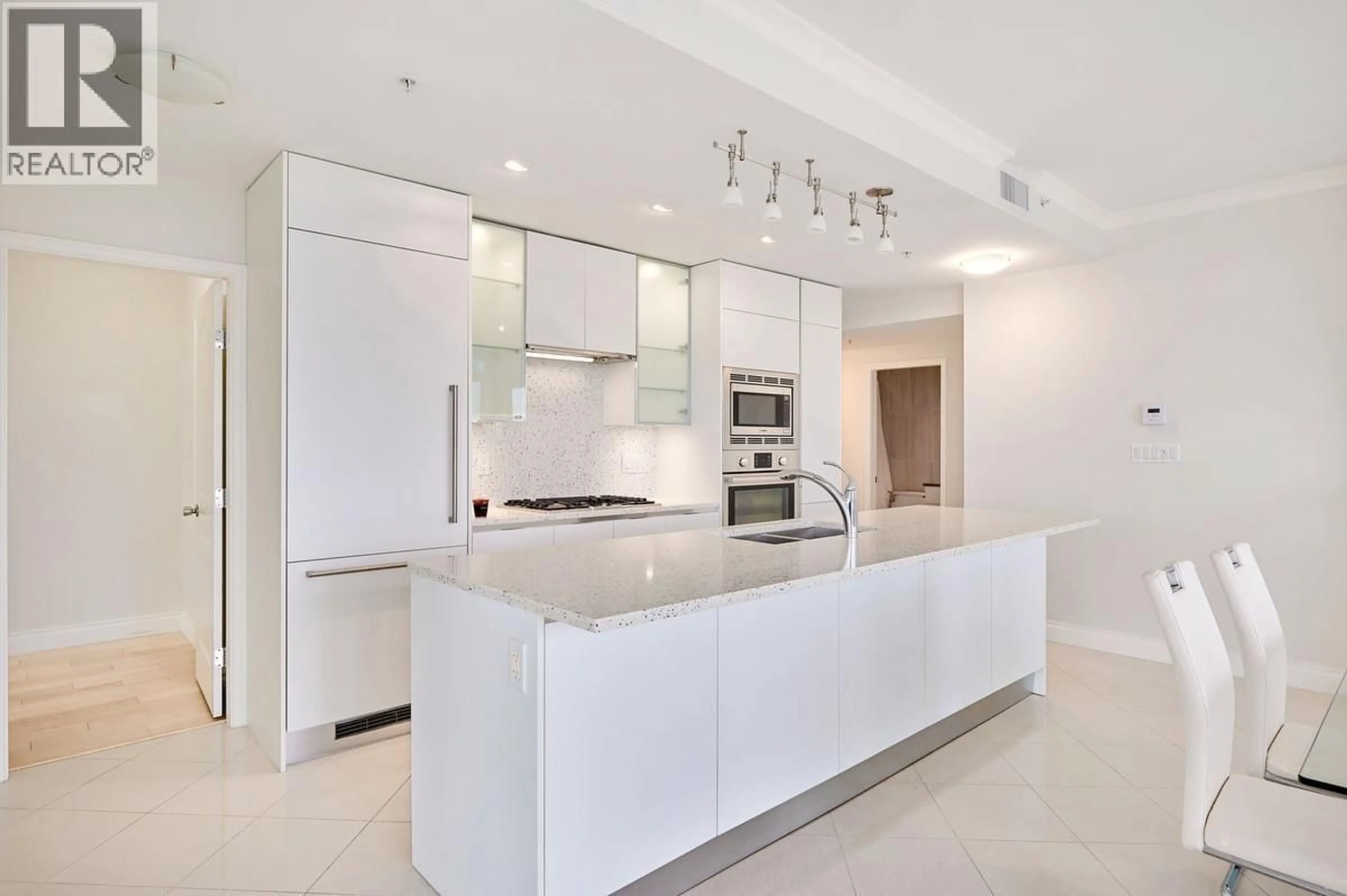 Contemporary kitchen, ceramic/tile floor for 401 - 199 VICTORY SHIP WAY, North Vancouver British Columbia V7L0B5