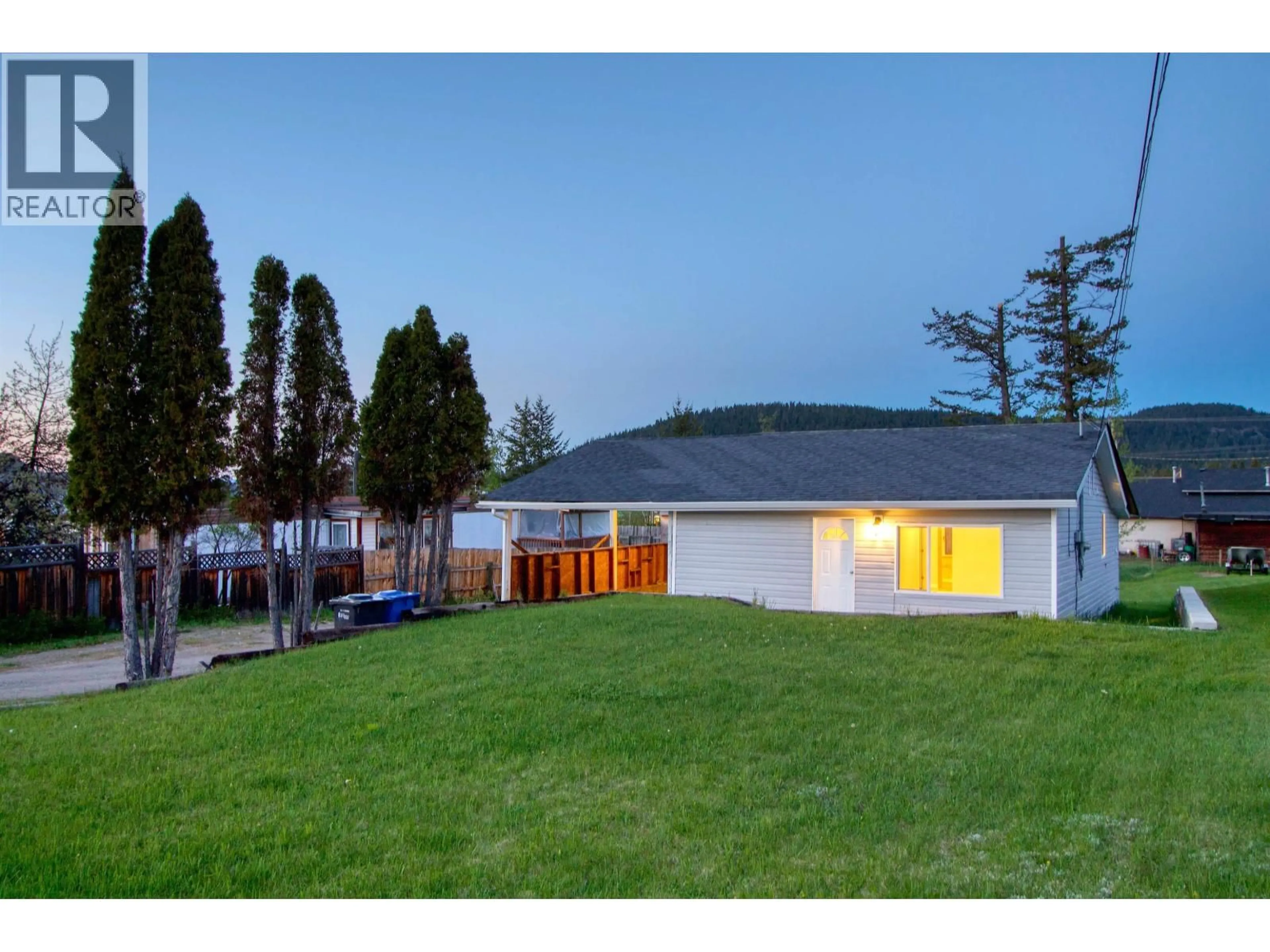 A pic from outside/outdoor area/front of a property/back of a property/a pic from drone, unknown for 933 SCOTT ROAD, 100 Mile House British Columbia V0K2E0