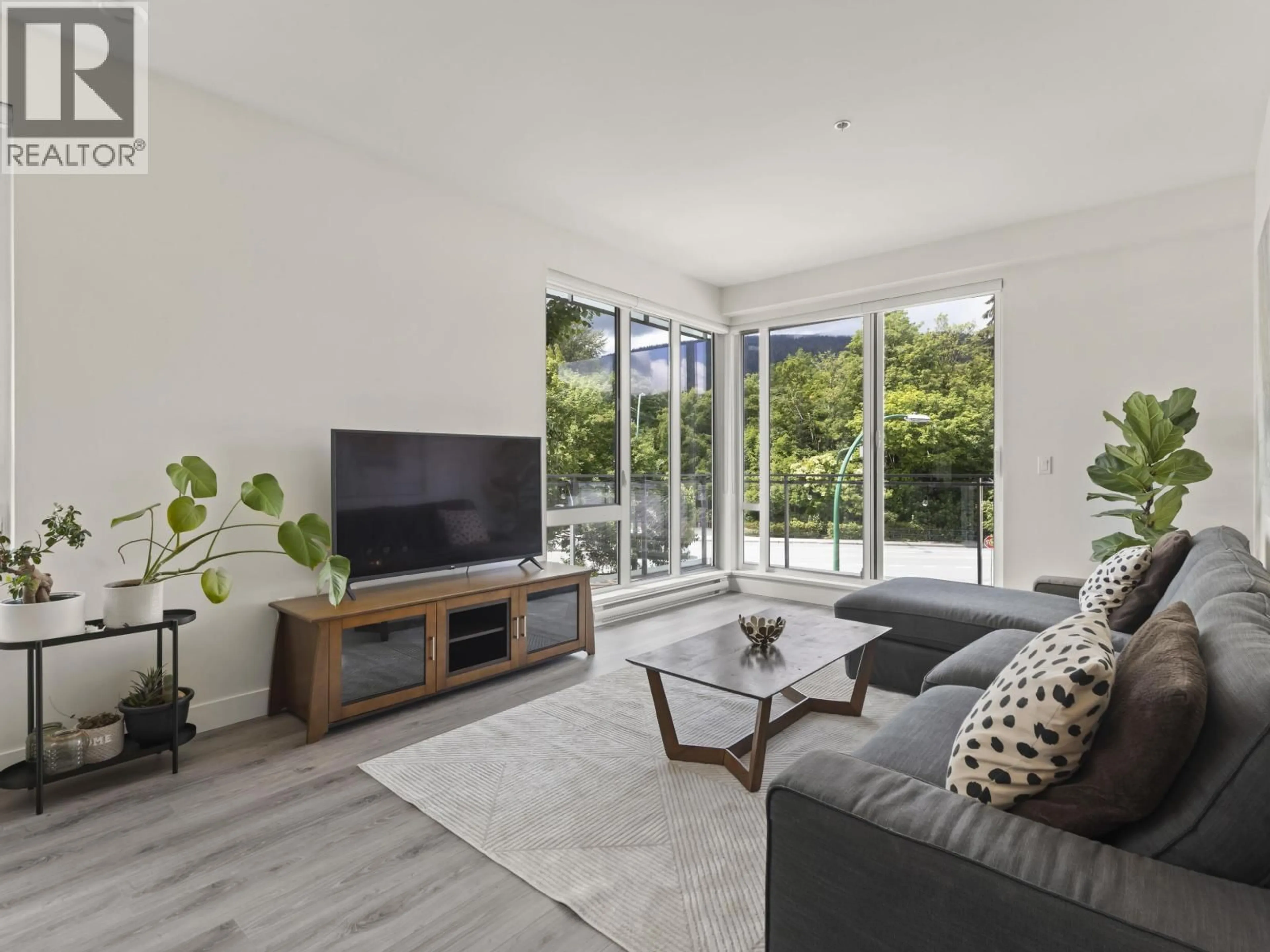 Living room with furniture, unknown for 303 - 1327 DRAYCOTT ROAD, North Vancouver British Columbia V7J1W1