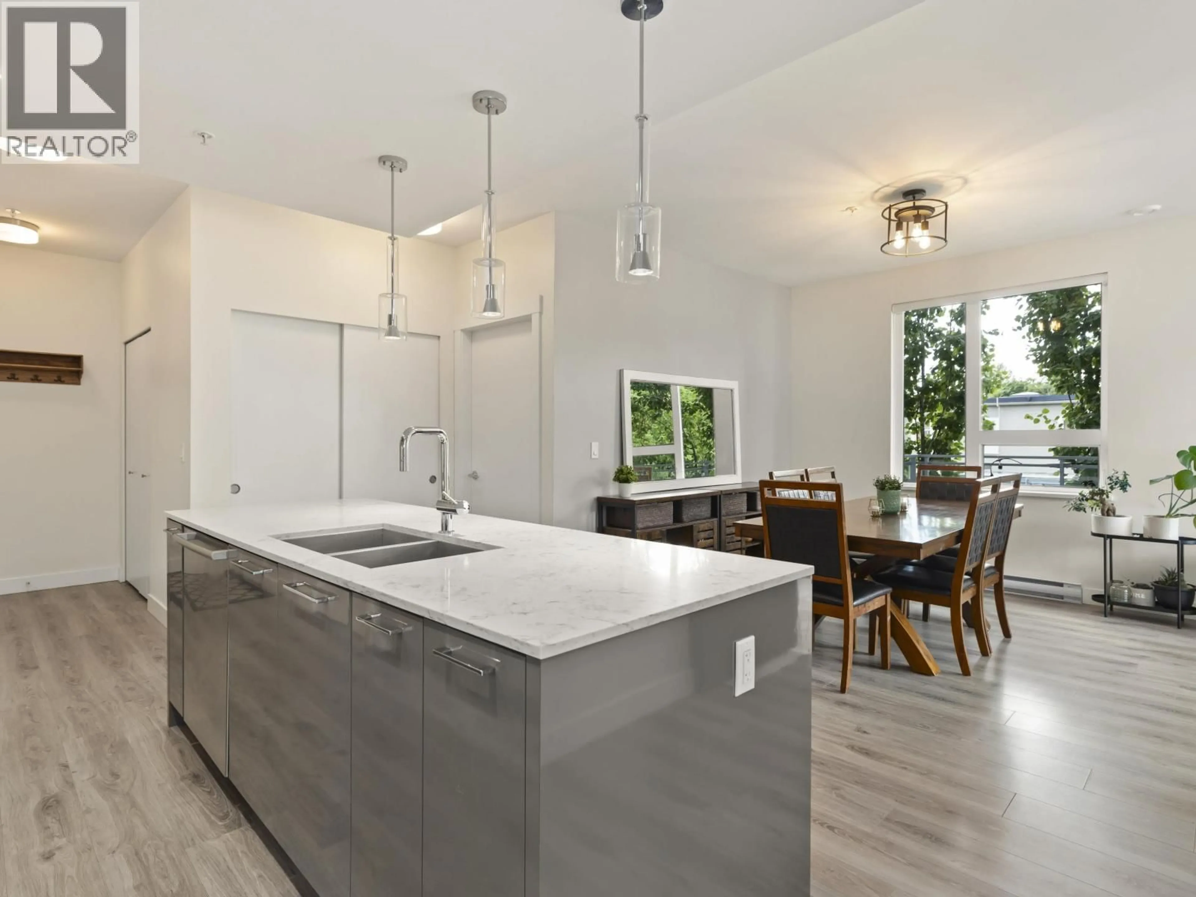 Open concept kitchen, unknown for 303 - 1327 DRAYCOTT ROAD, North Vancouver British Columbia V7J1W1