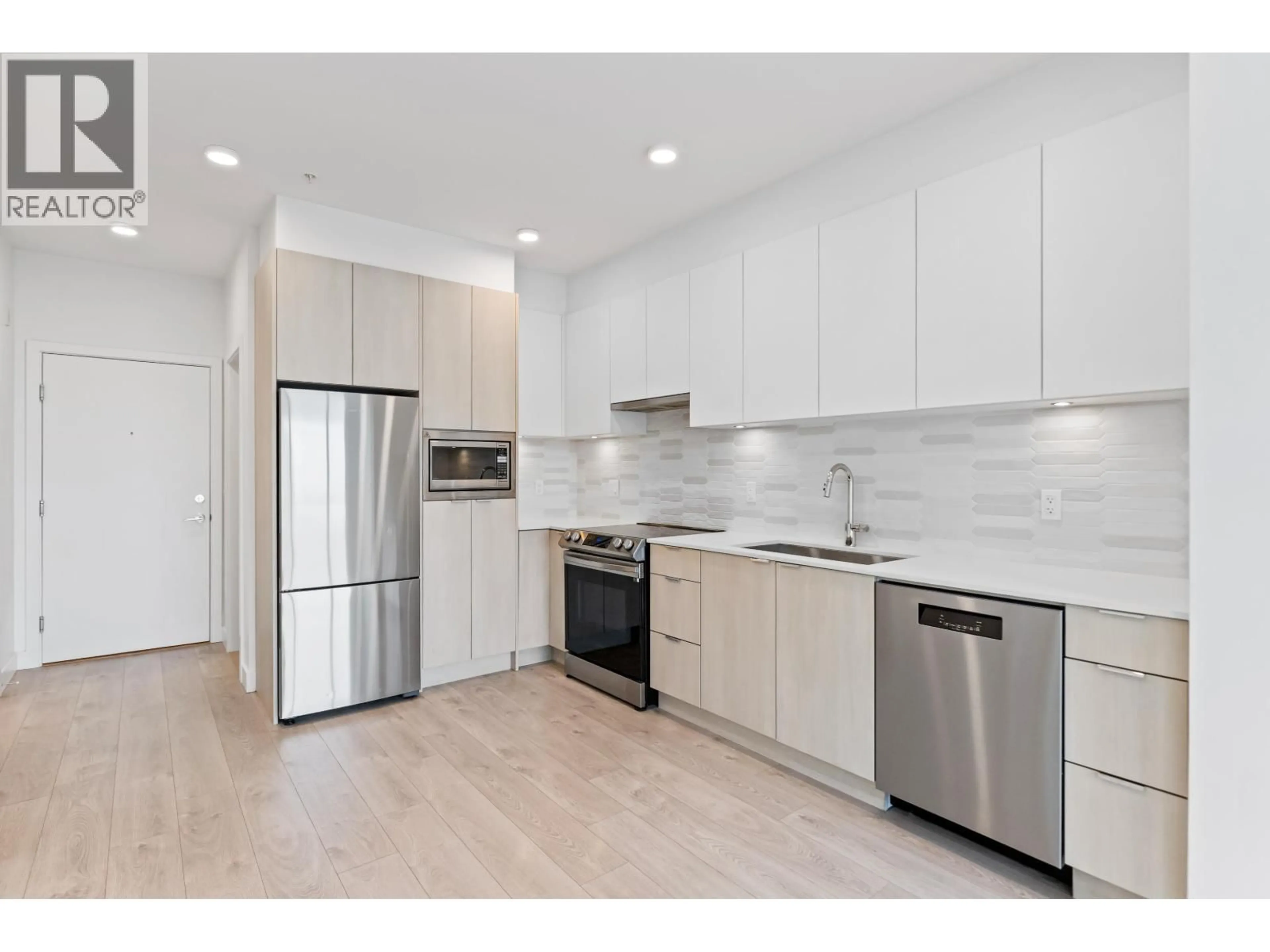 Open concept kitchen, unknown for 418 - 2499 RABBIT DRIVE, Tsawwassen British Columbia V4M0G4