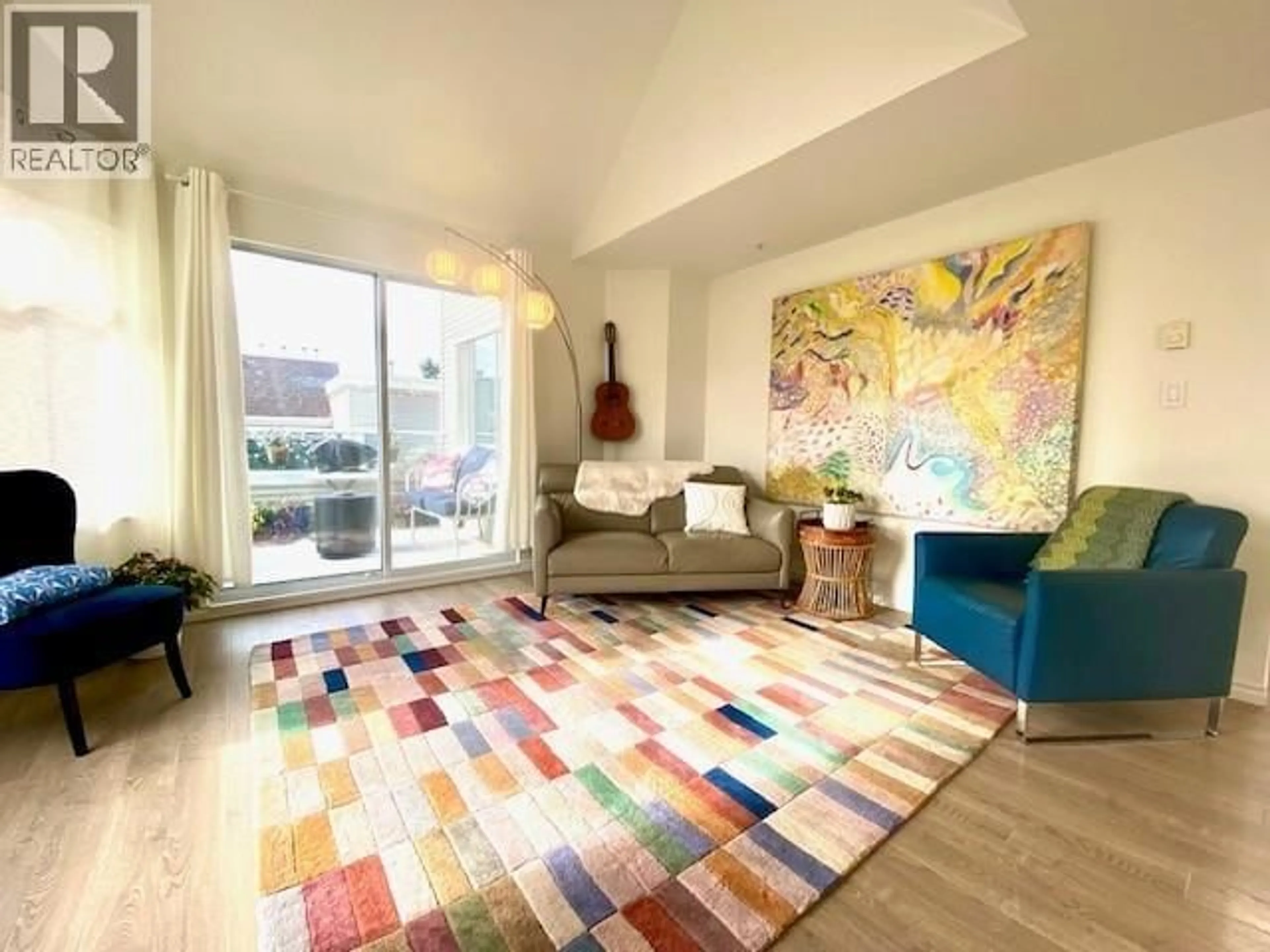 Living room with furniture, carpet floor for 401 - 3638 RAE AVENUE, Vancouver British Columbia V5R2P5