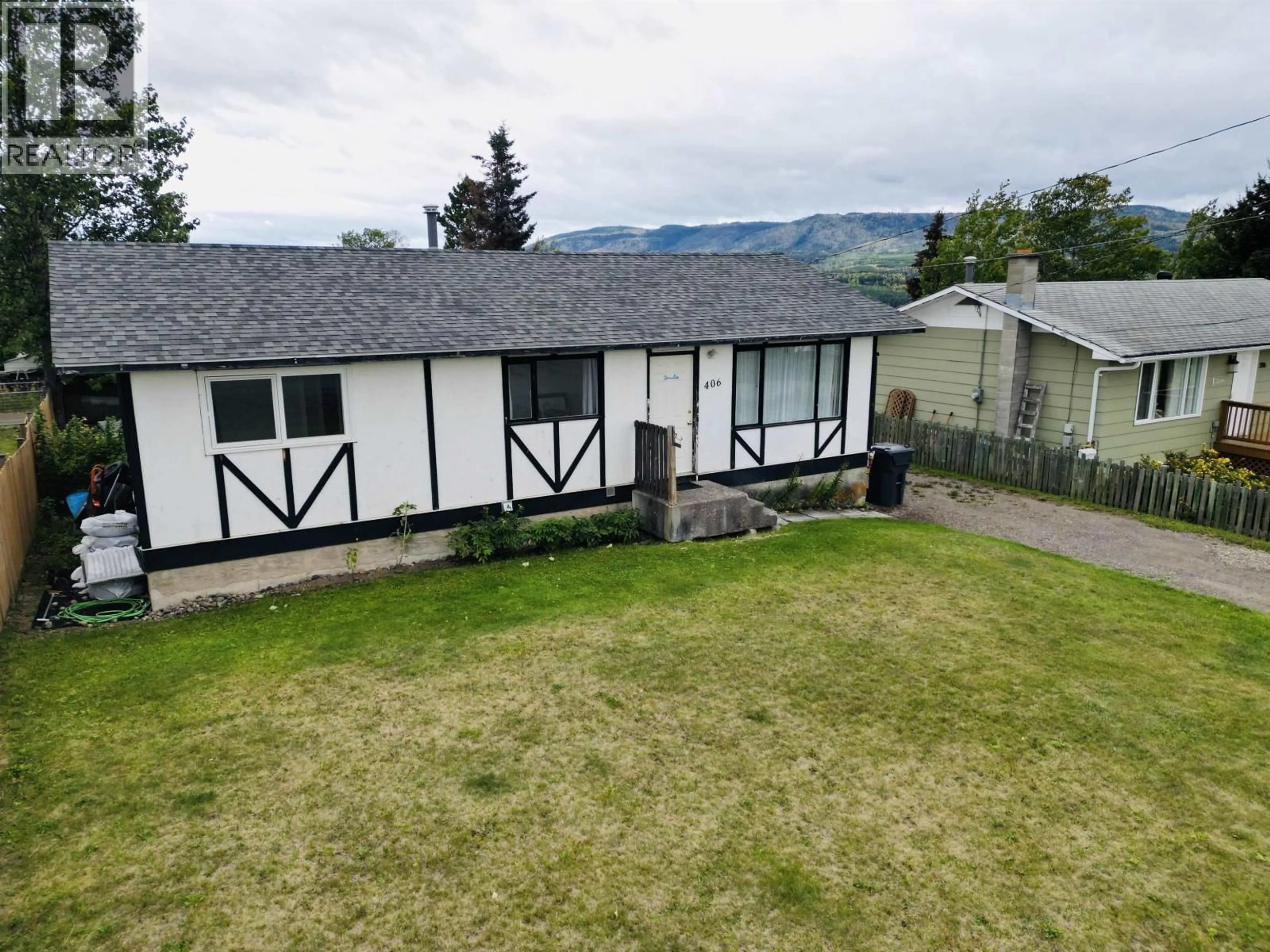 A pic from outside/outdoor area/front of a property/back of a property/a pic from drone, mountain view for 406 4TH AVENUE, Burns Lake British Columbia V0J1E0