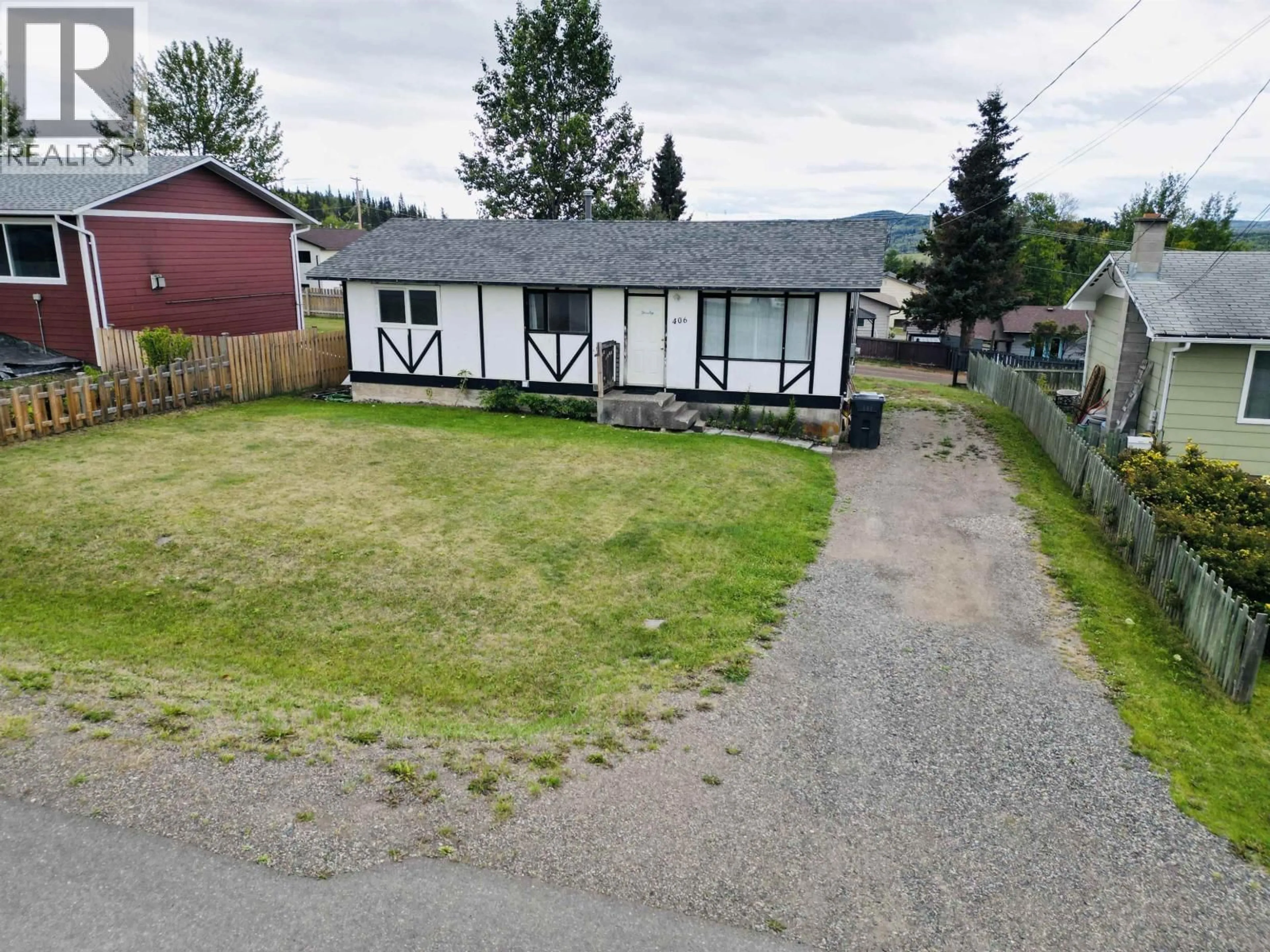 A pic from outside/outdoor area/front of a property/back of a property/a pic from drone, street for 406 4TH AVENUE, Burns Lake British Columbia V0J1E0