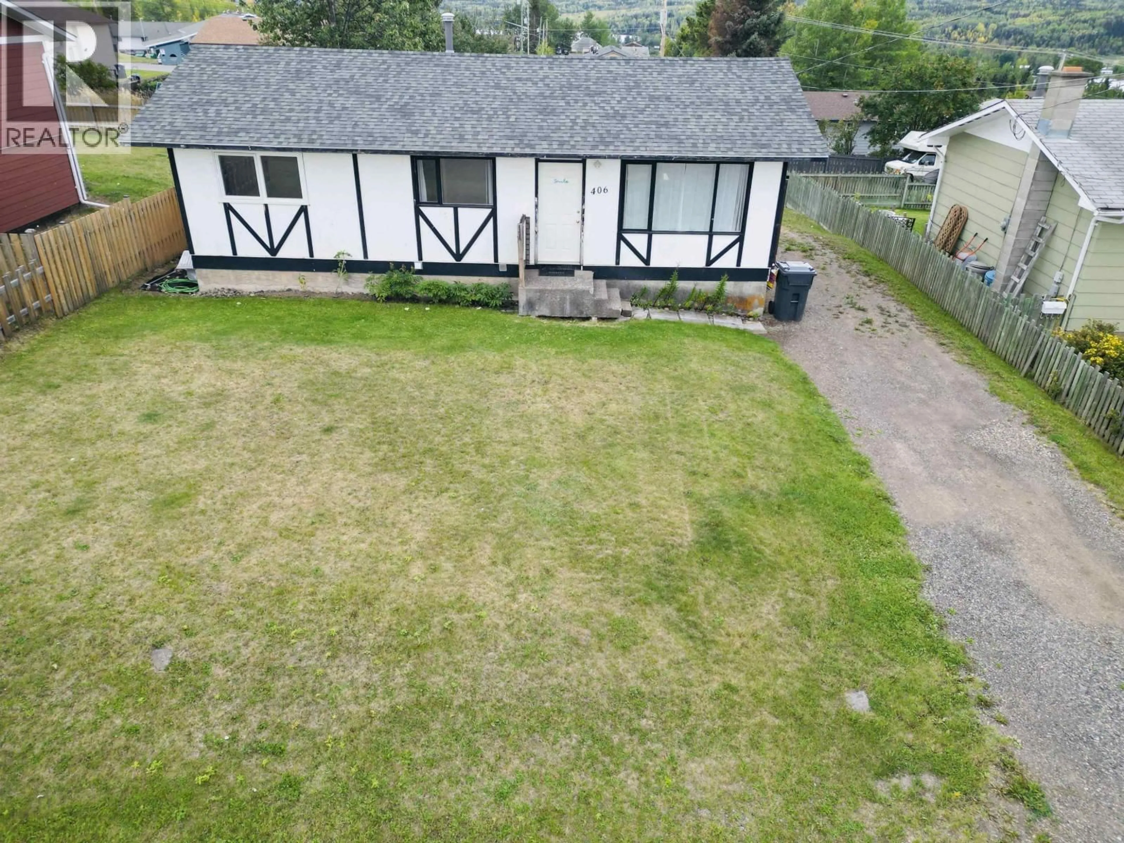 A pic from outside/outdoor area/front of a property/back of a property/a pic from drone, street for 406 4TH AVENUE, Burns Lake British Columbia V0J1E0