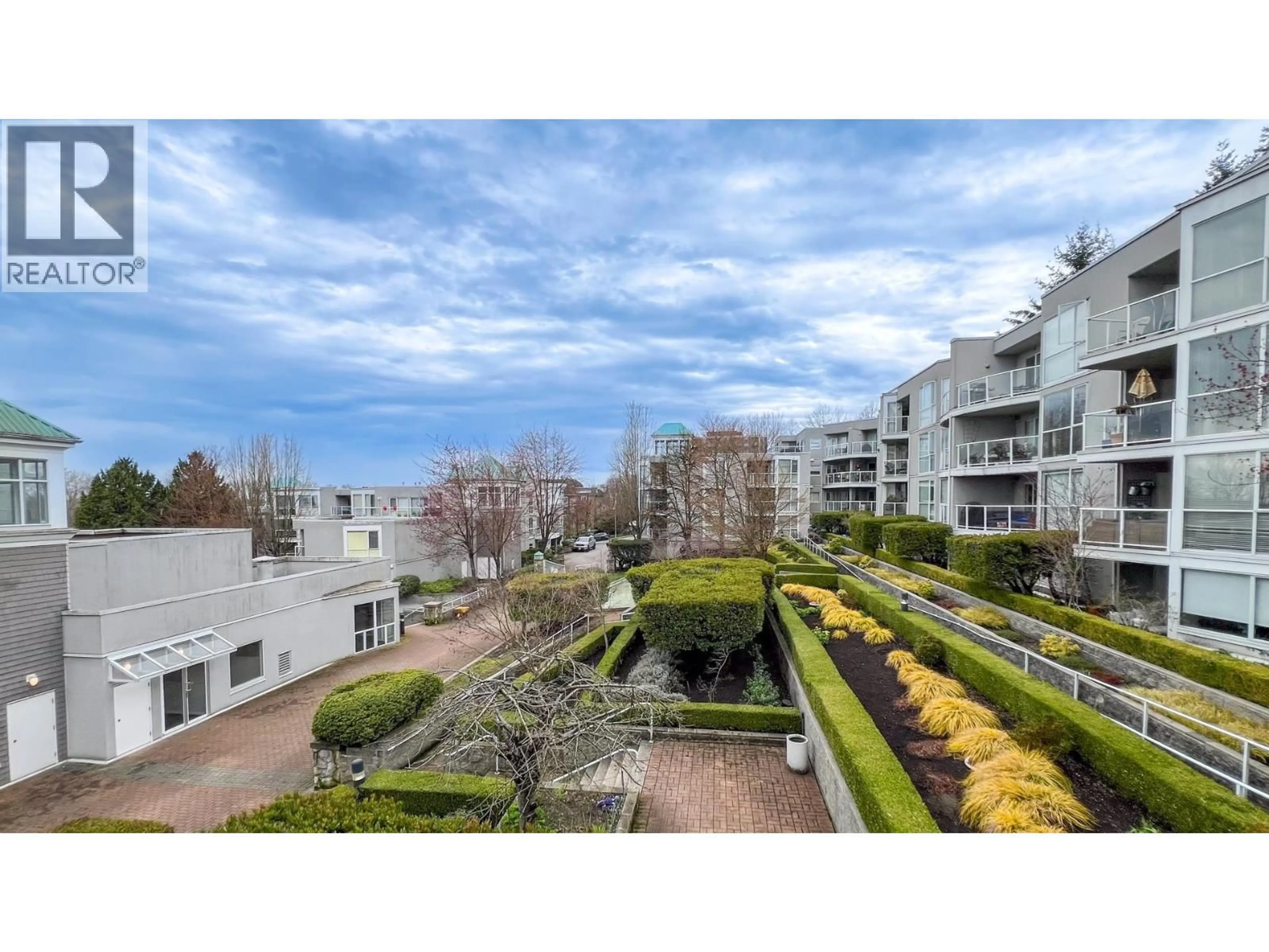A pic from outside/outdoor area/front of a property/back of a property/a pic from drone, city buildings view from balcony for 205 - 8430 JELLICOE STREET, Vancouver British Columbia V5S4S7