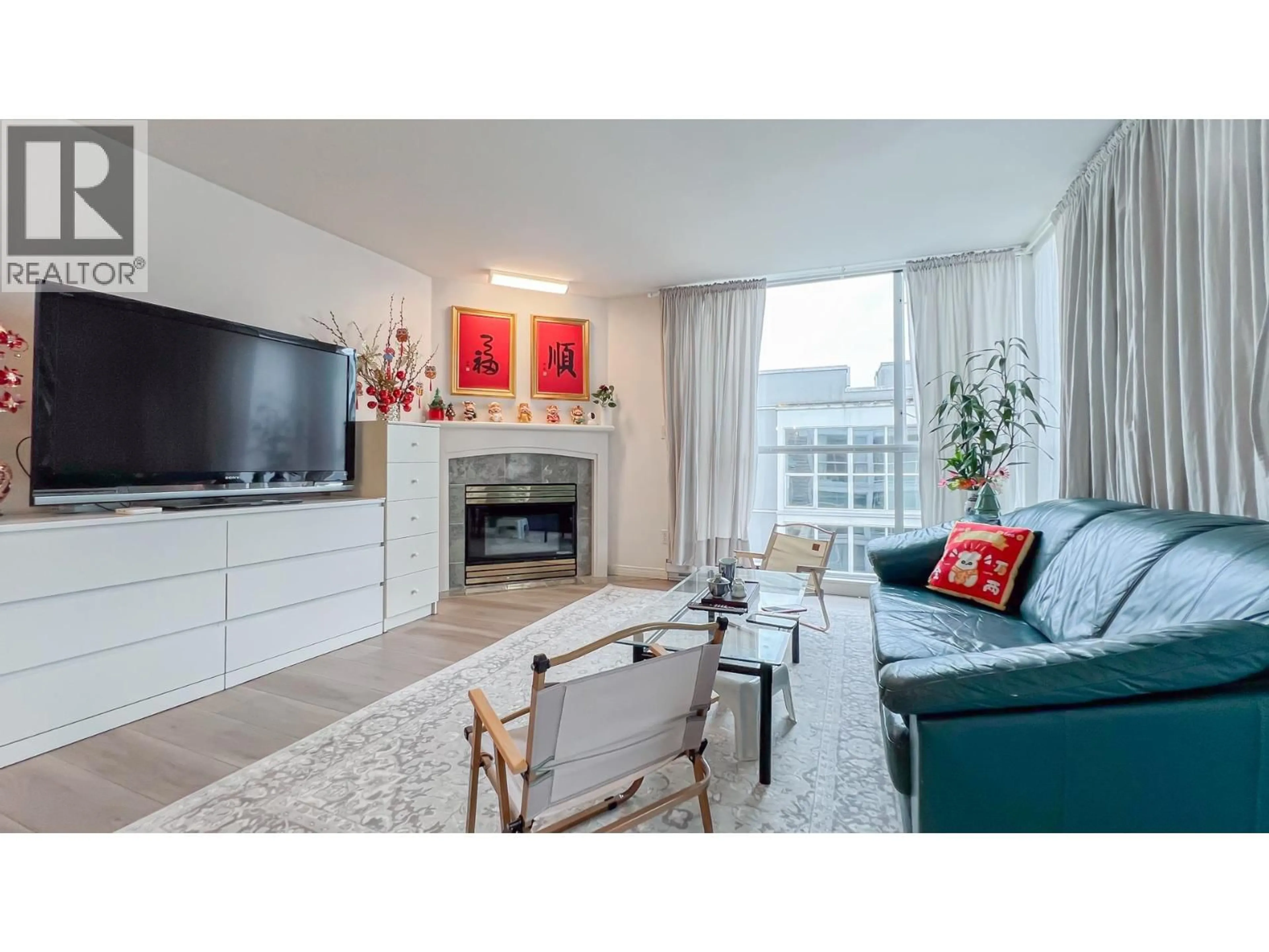 Living room with furniture, unknown for 205 - 8430 JELLICOE STREET, Vancouver British Columbia V5S4S7