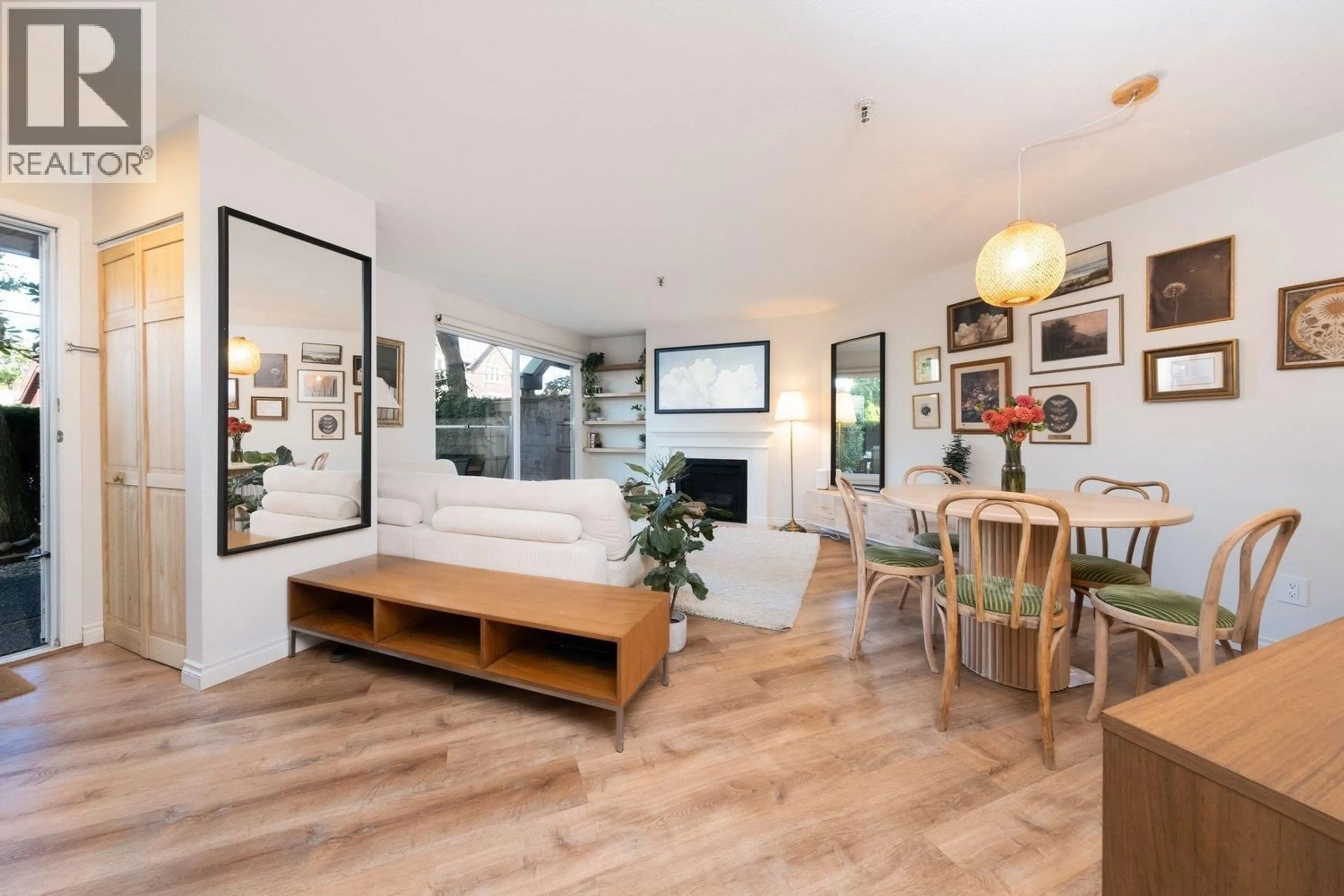 Living room with furniture, wood/laminate floor for 112 - 2020 8TH AVENUE, Vancouver British Columbia V6J1W5