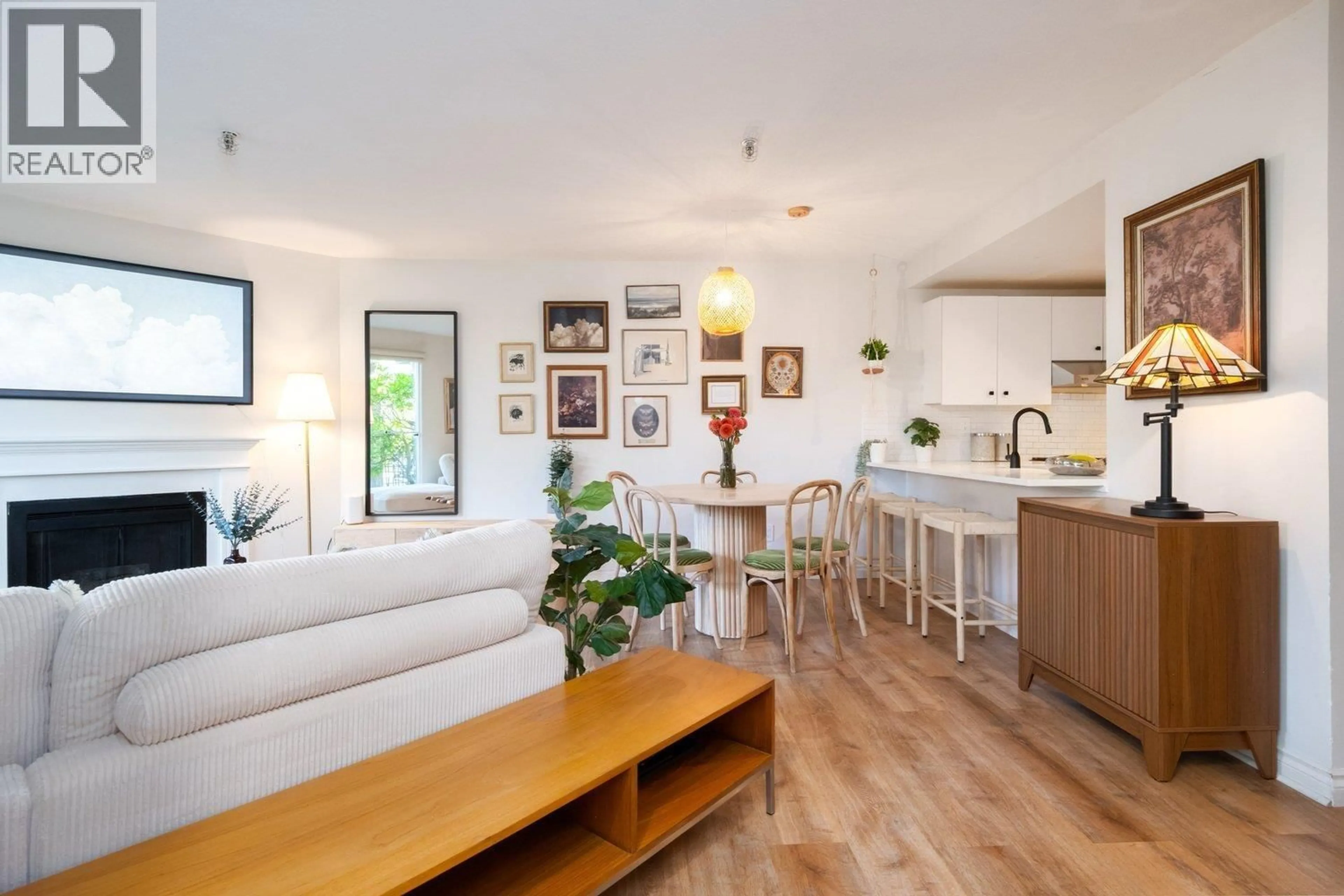 Living room with furniture, wood/laminate floor for 112 - 2020 8TH AVENUE, Vancouver British Columbia V6J1W5
