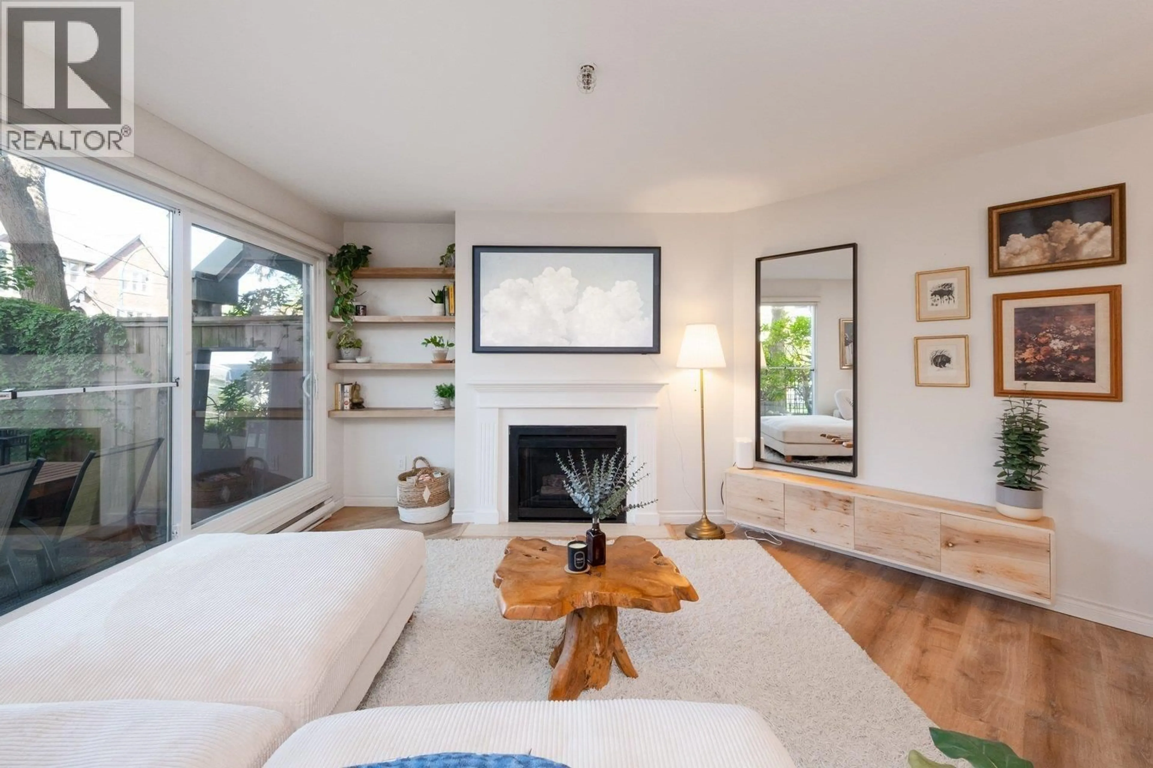 Living room with furniture, wood/laminate floor for 112 - 2020 8TH AVENUE, Vancouver British Columbia V6J1W5