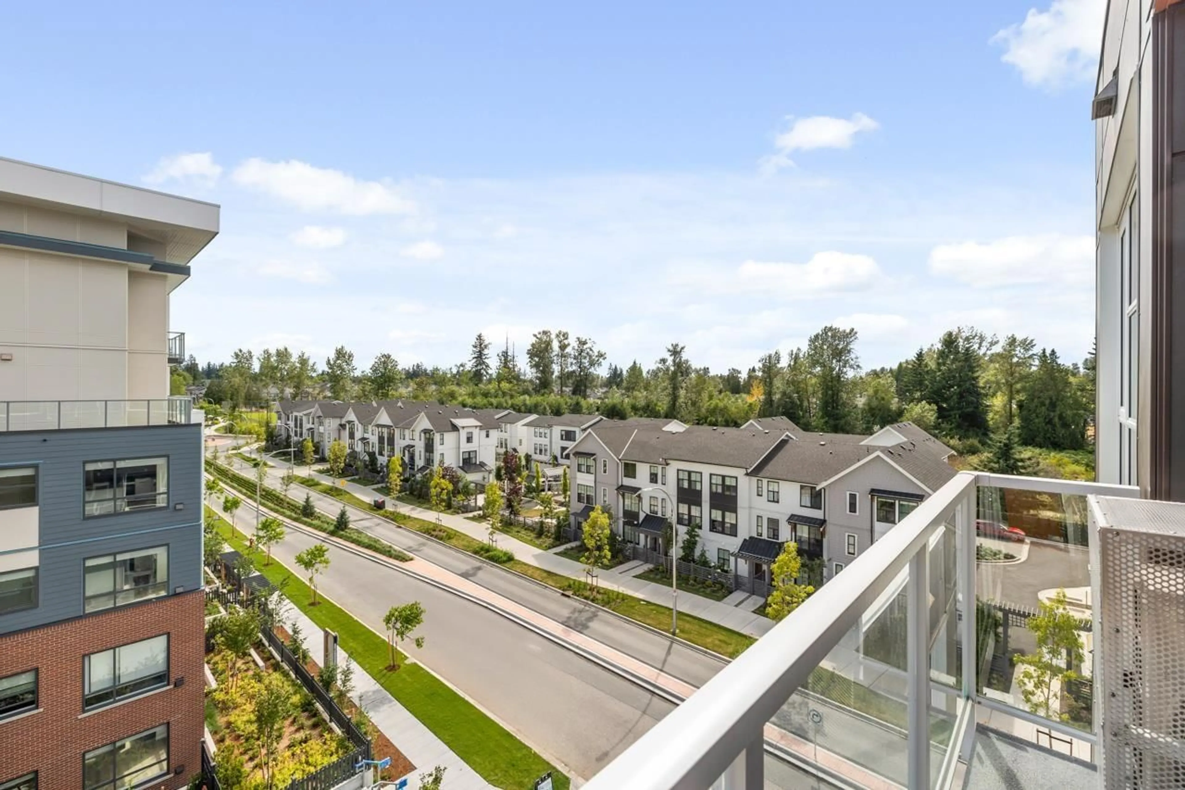 A pic from outside/outdoor area/front of a property/back of a property/a pic from drone, city buildings view from balcony for 403 - 20614 80, Langley British Columbia V2Y3W7