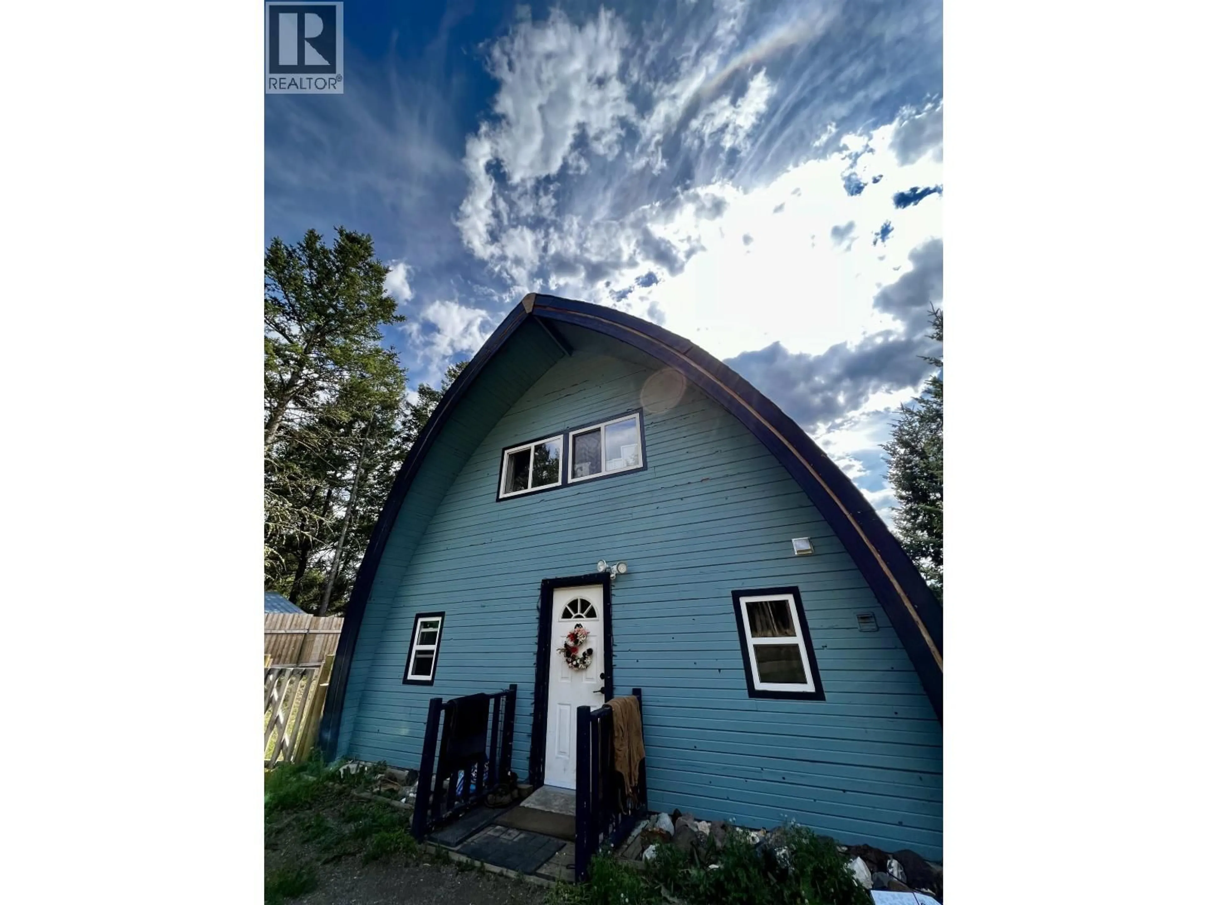 A pic from outside/outdoor area/front of a property/back of a property/a pic from drone, unknown for 5023 GLOINNZUN DRIVE, 108 Mile Ranch British Columbia V0K2Z0