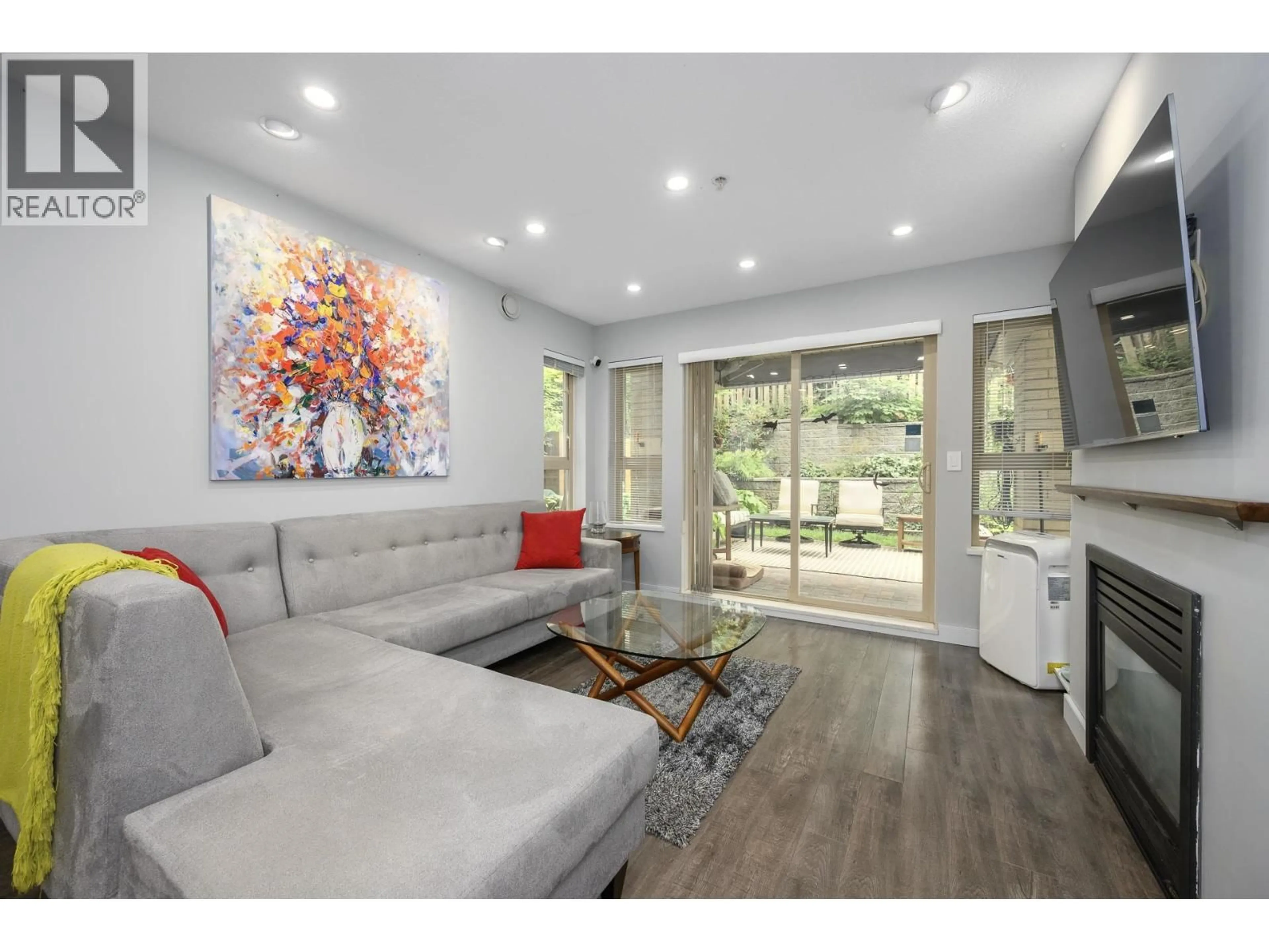 Living room with furniture, unknown for 210 - 9319 UNIVERSITY CRESCENT, Burnaby British Columbia V5A4Y5
