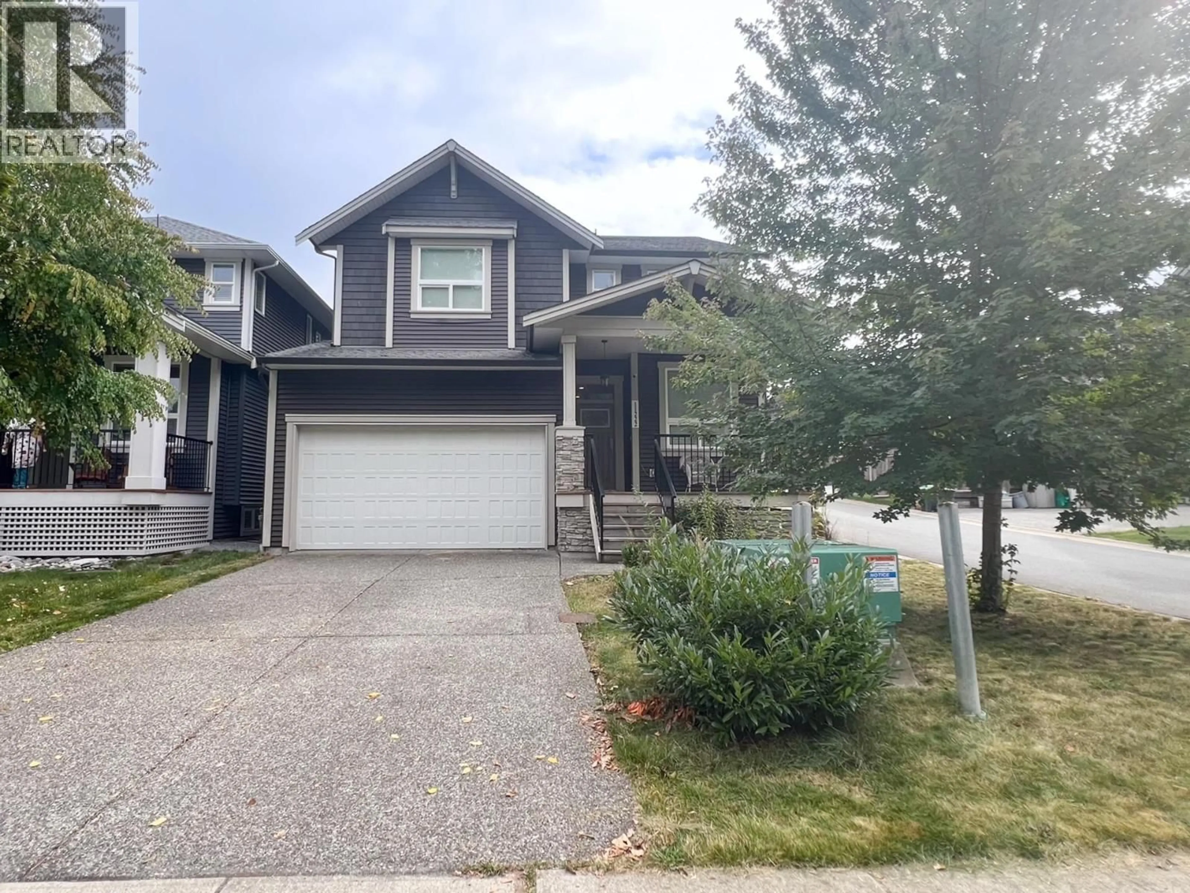 Home with vinyl exterior material, street for 11222 243B STREET, Maple Ridge British Columbia V2W1H5
