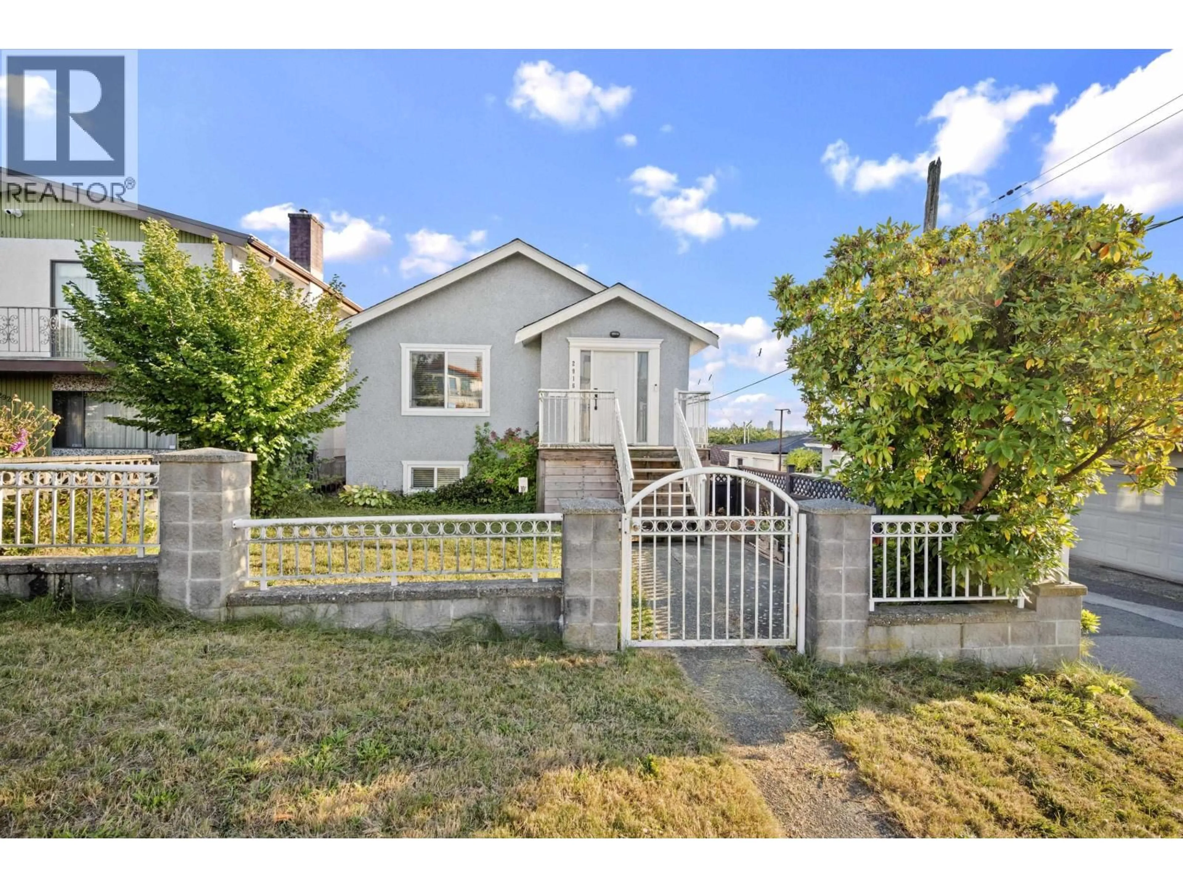A pic from outside/outdoor area/front of a property/back of a property/a pic from drone, street for 2916 6TH AVENUE, Vancouver British Columbia V5M1S1
