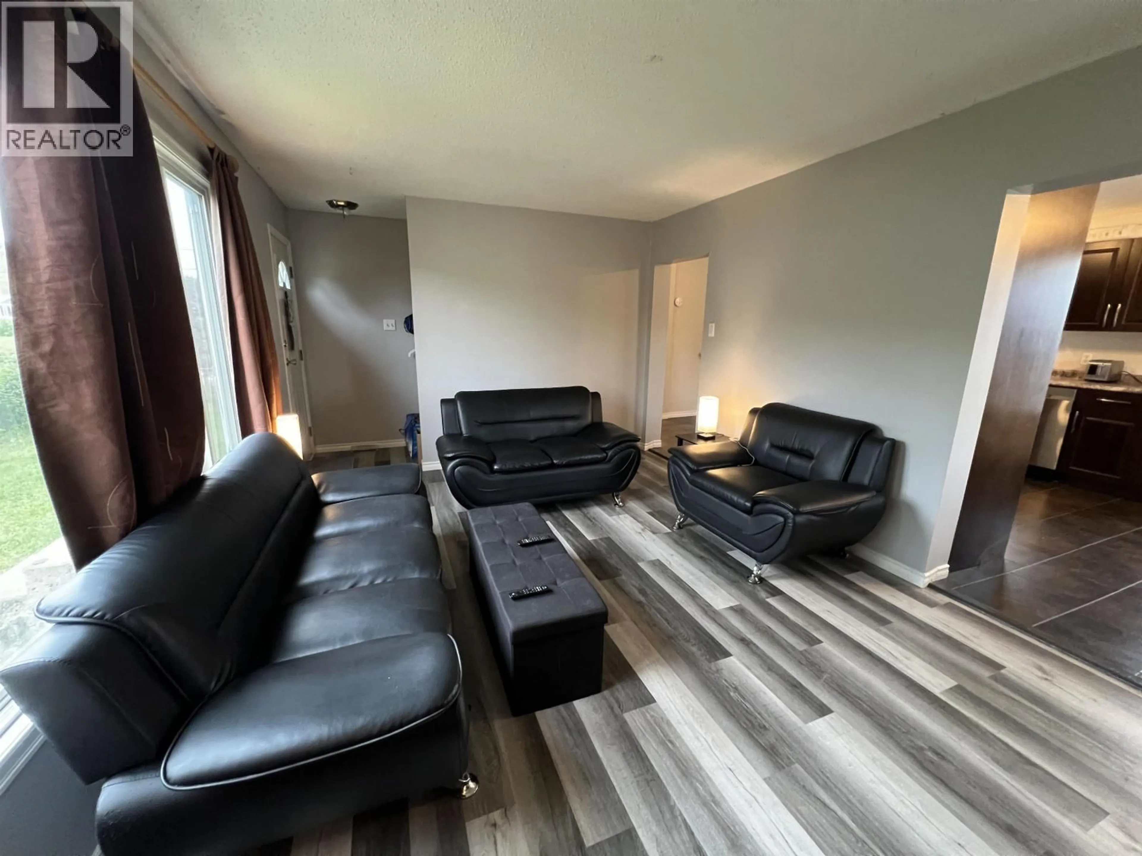 Living room with furniture, unknown for 5524 48 STREET, Fort Nelson British Columbia V0C1R0