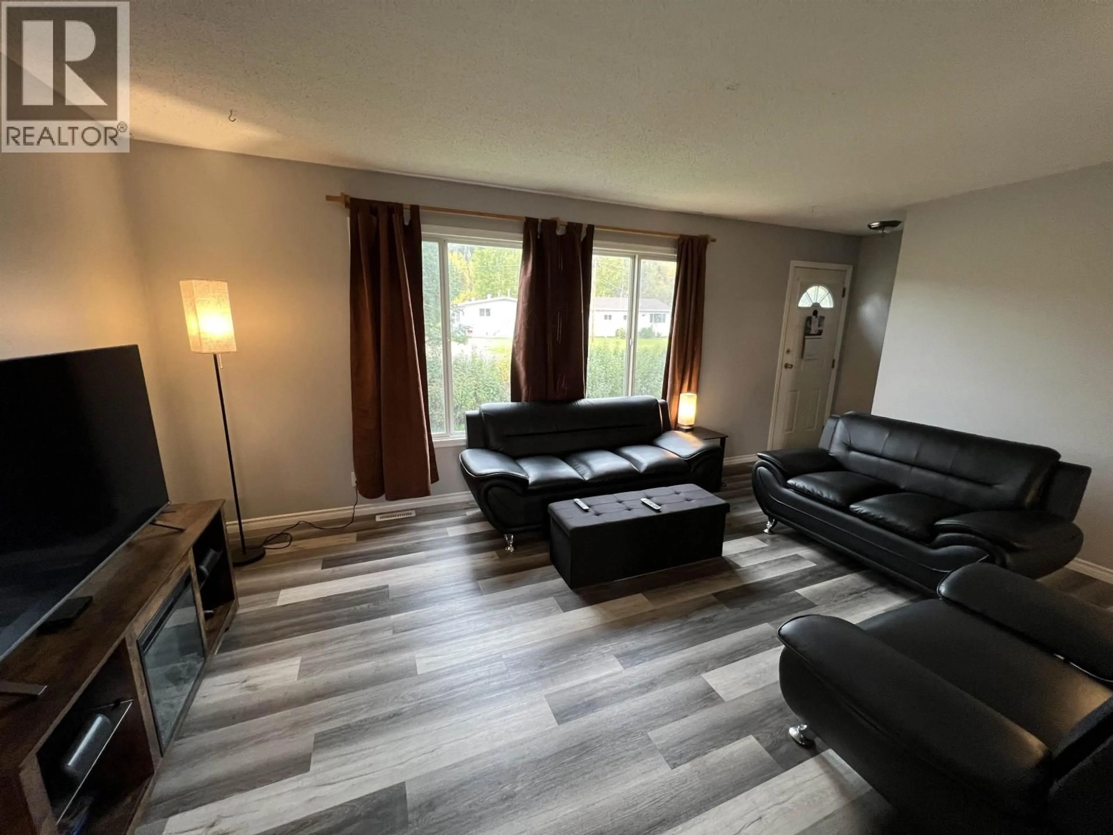 Living room with furniture, unknown for 5524 48 STREET, Fort Nelson British Columbia V0C1R0