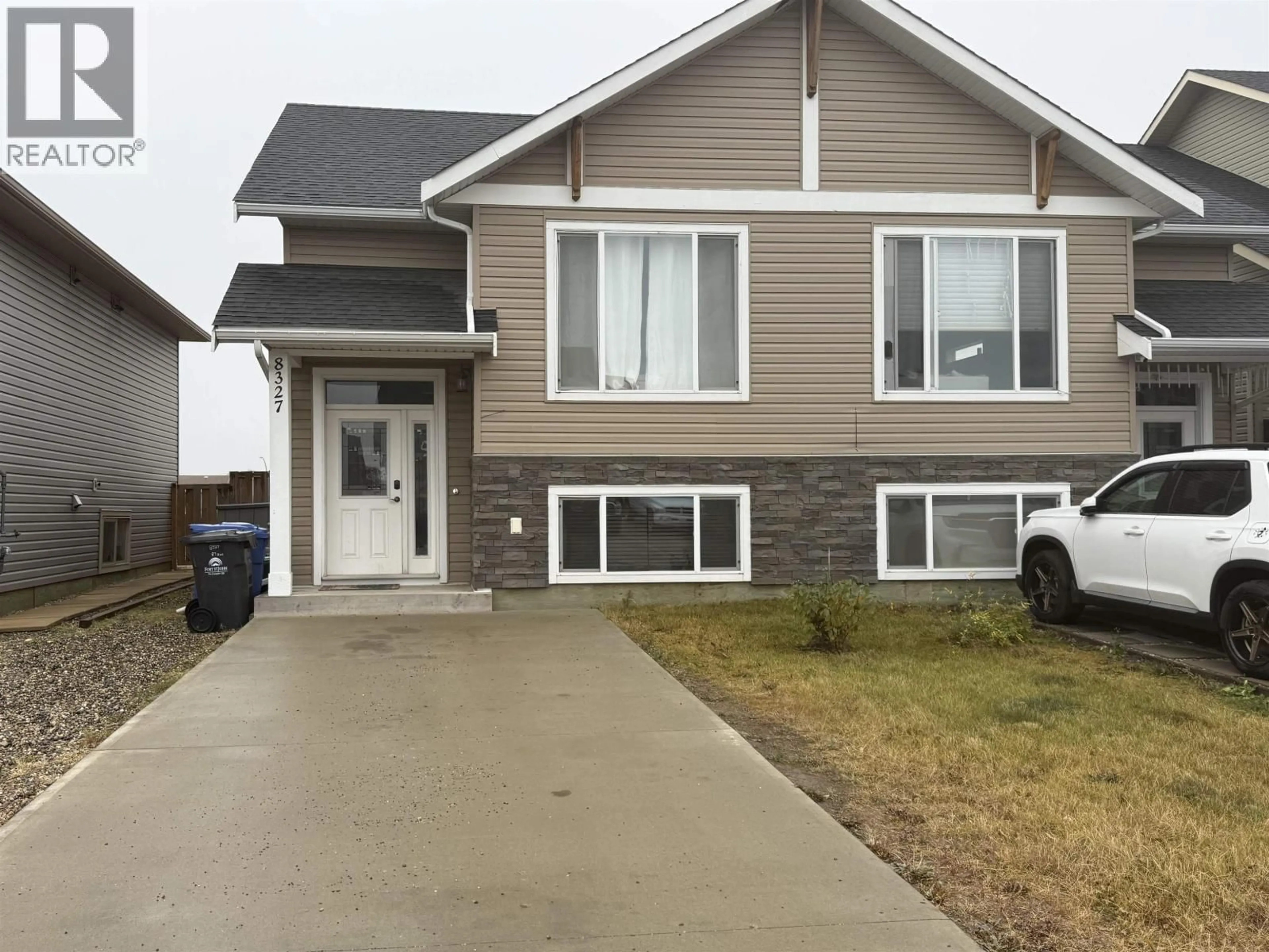 Home with vinyl exterior material, street for 8327 87 AVENUE, Fort St. John British Columbia V1J0G8