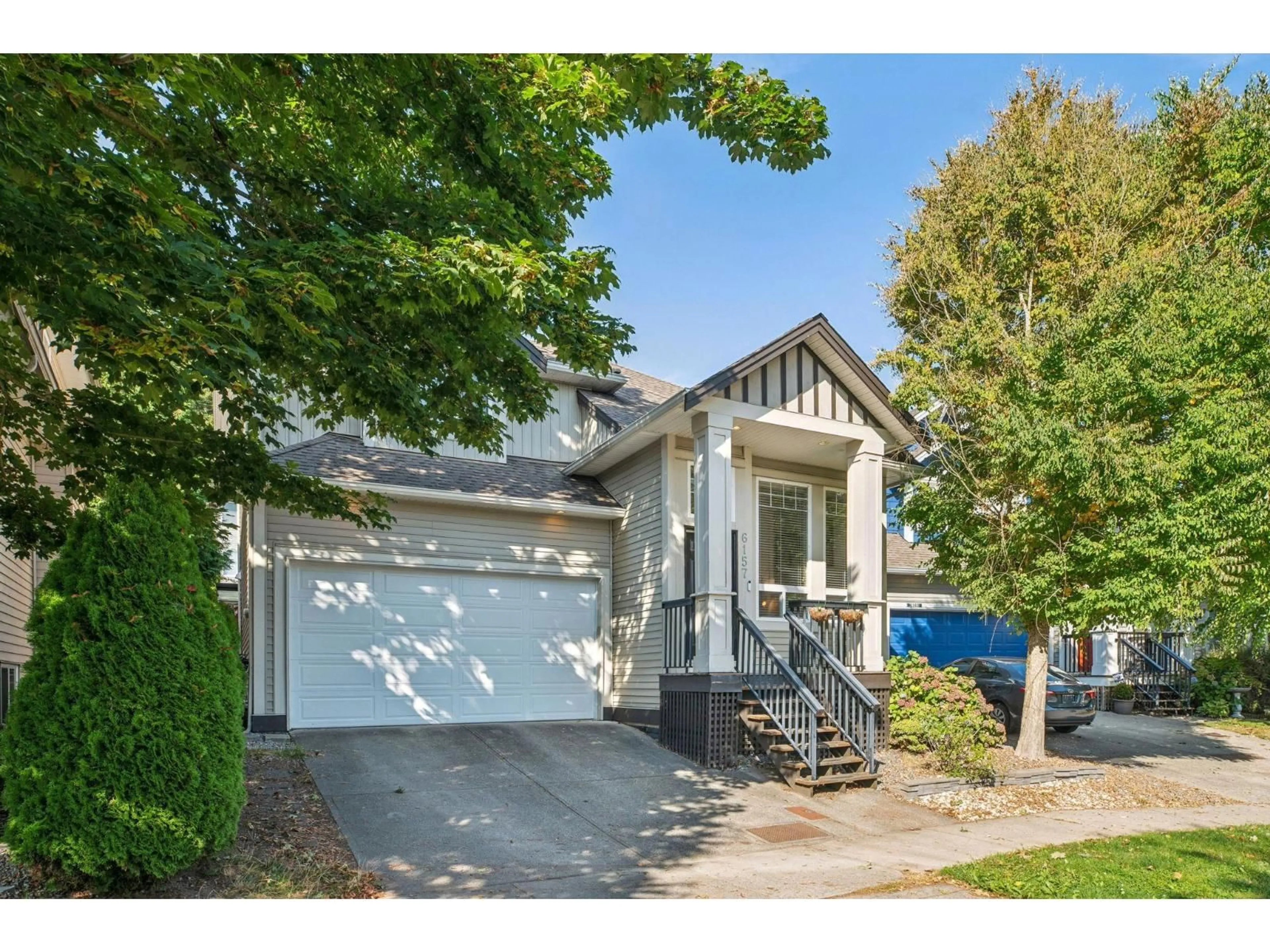 Home with vinyl exterior material, street for 6157 150A, Surrey British Columbia V3S7W9