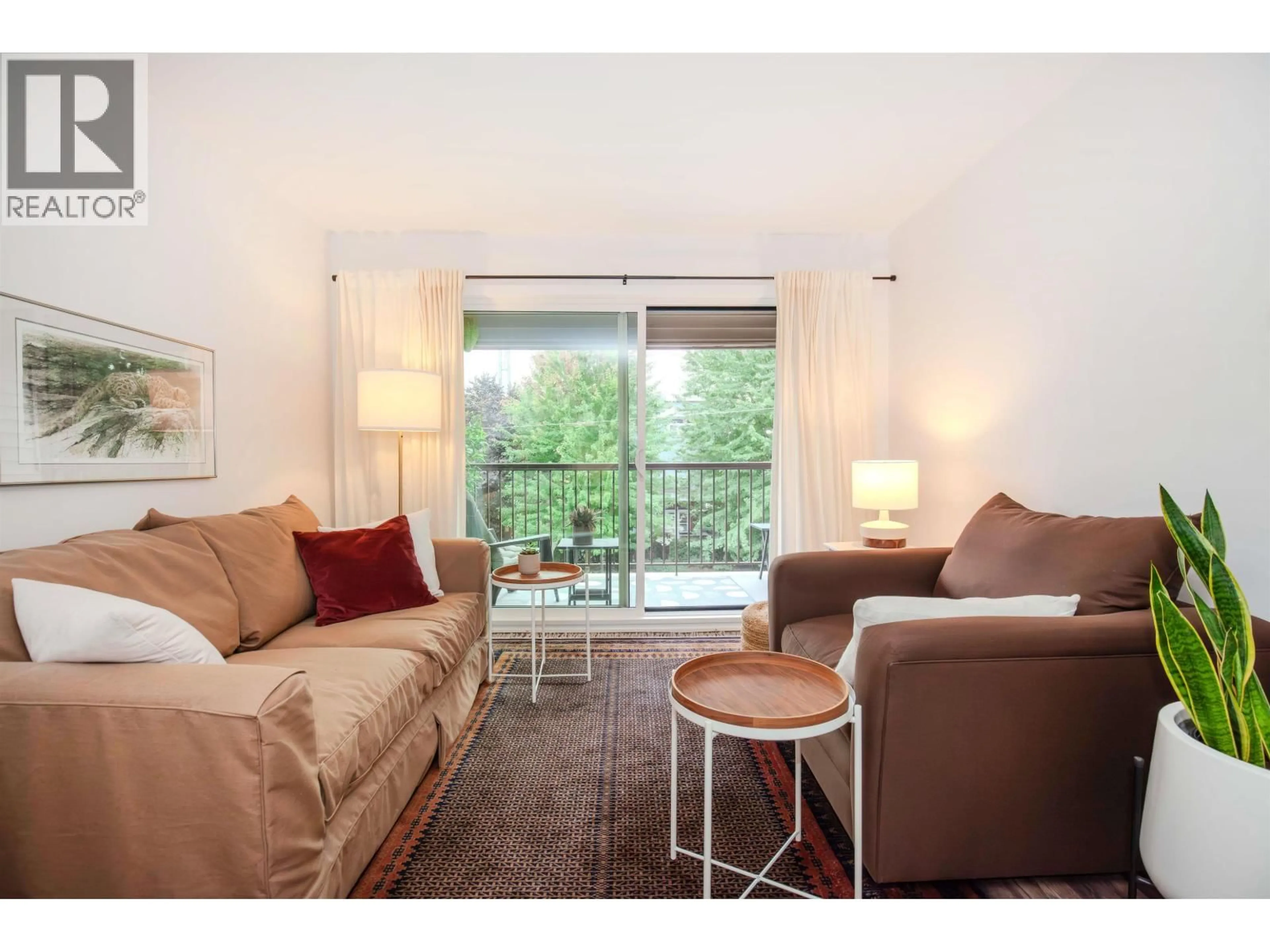 Living room with furniture, wood/laminate floor for 403 - 2045 FRANKLIN STREET, Vancouver British Columbia V5L1R4