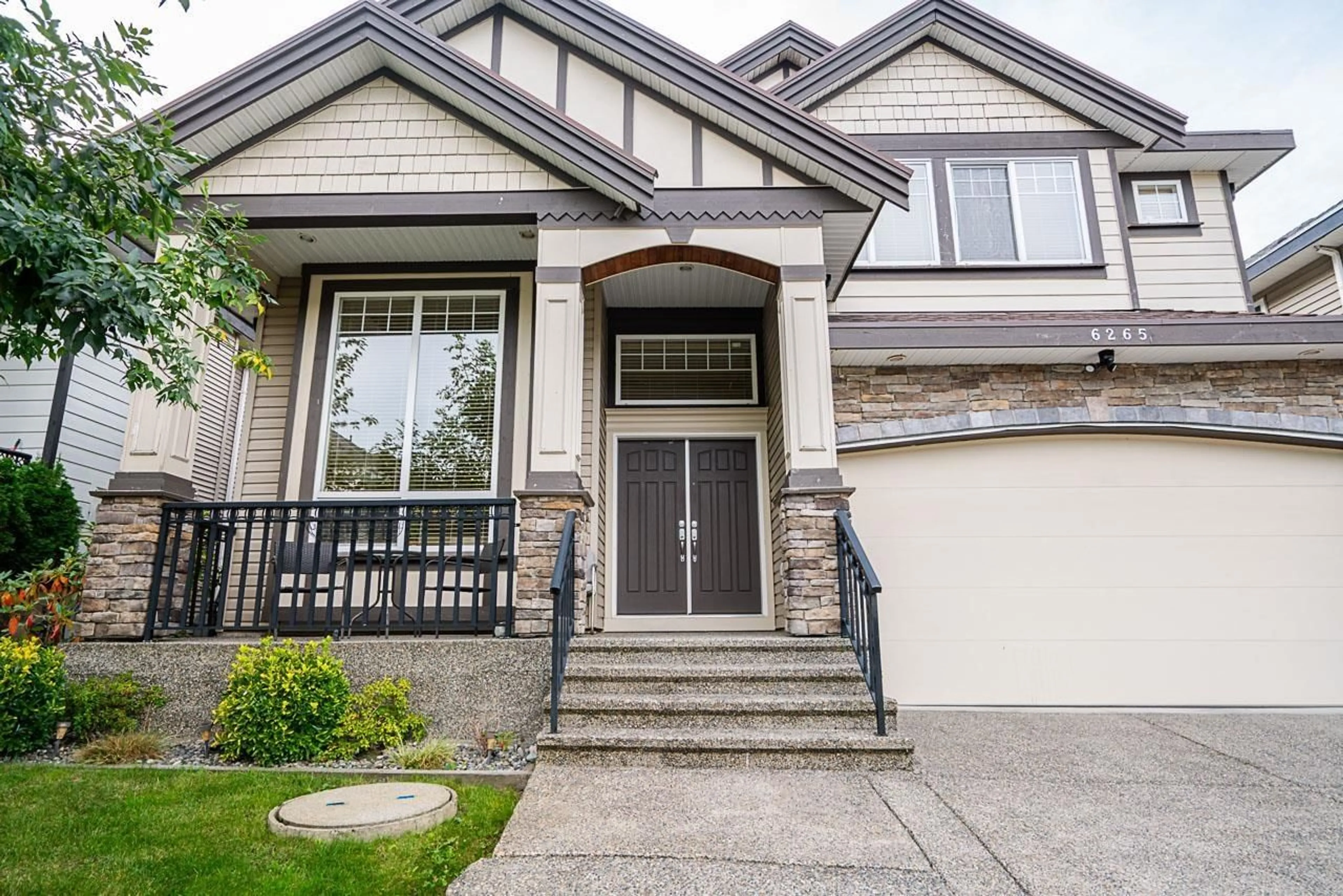 Home with vinyl exterior material, street for 6265 141A, Surrey British Columbia V3X0B2