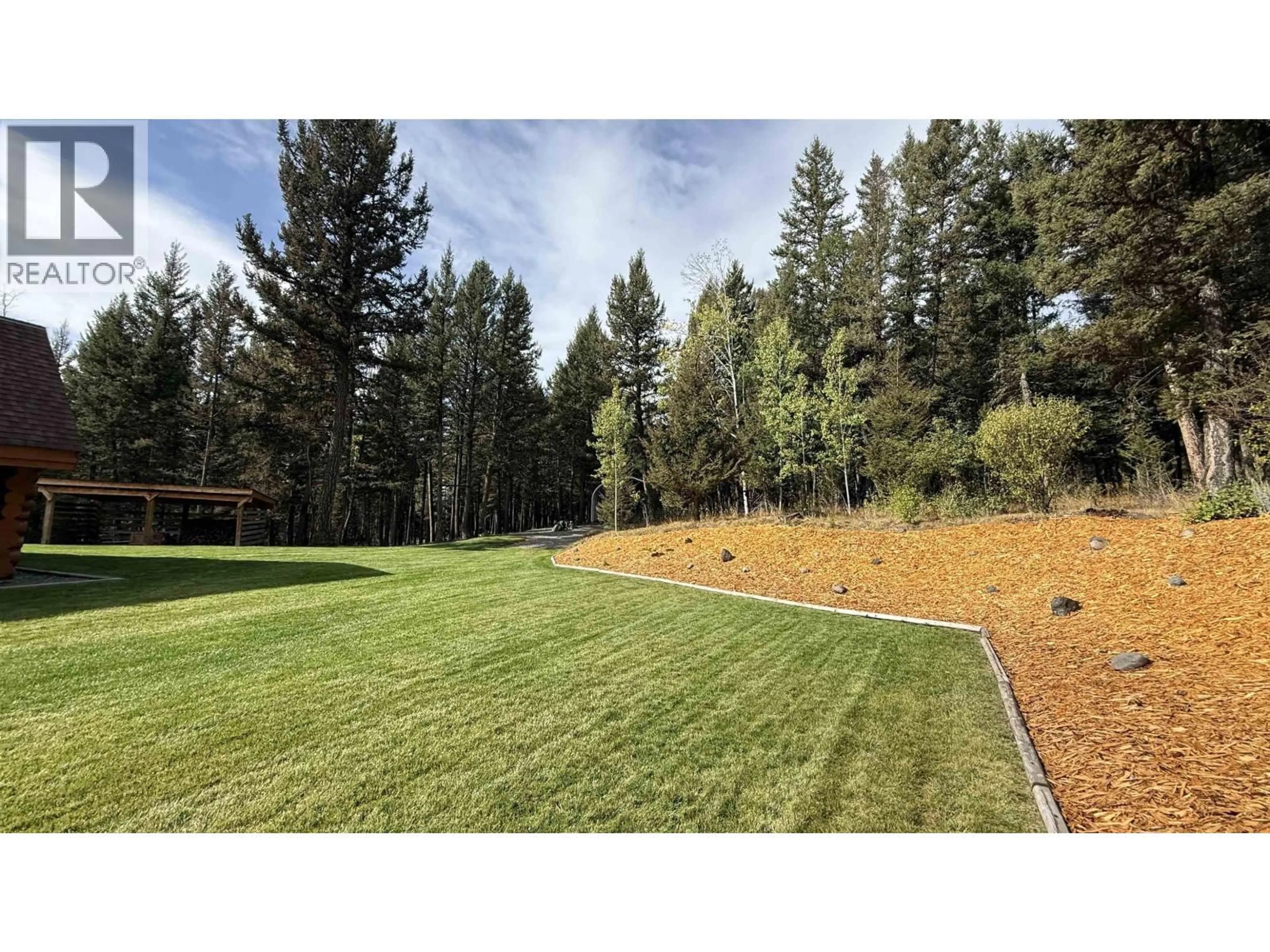 A pic from outside/outdoor area/front of a property/back of a property/a pic from drone, forest/trees view for 6300 GARY ROAD, Horse Lake British Columbia V0K2E3