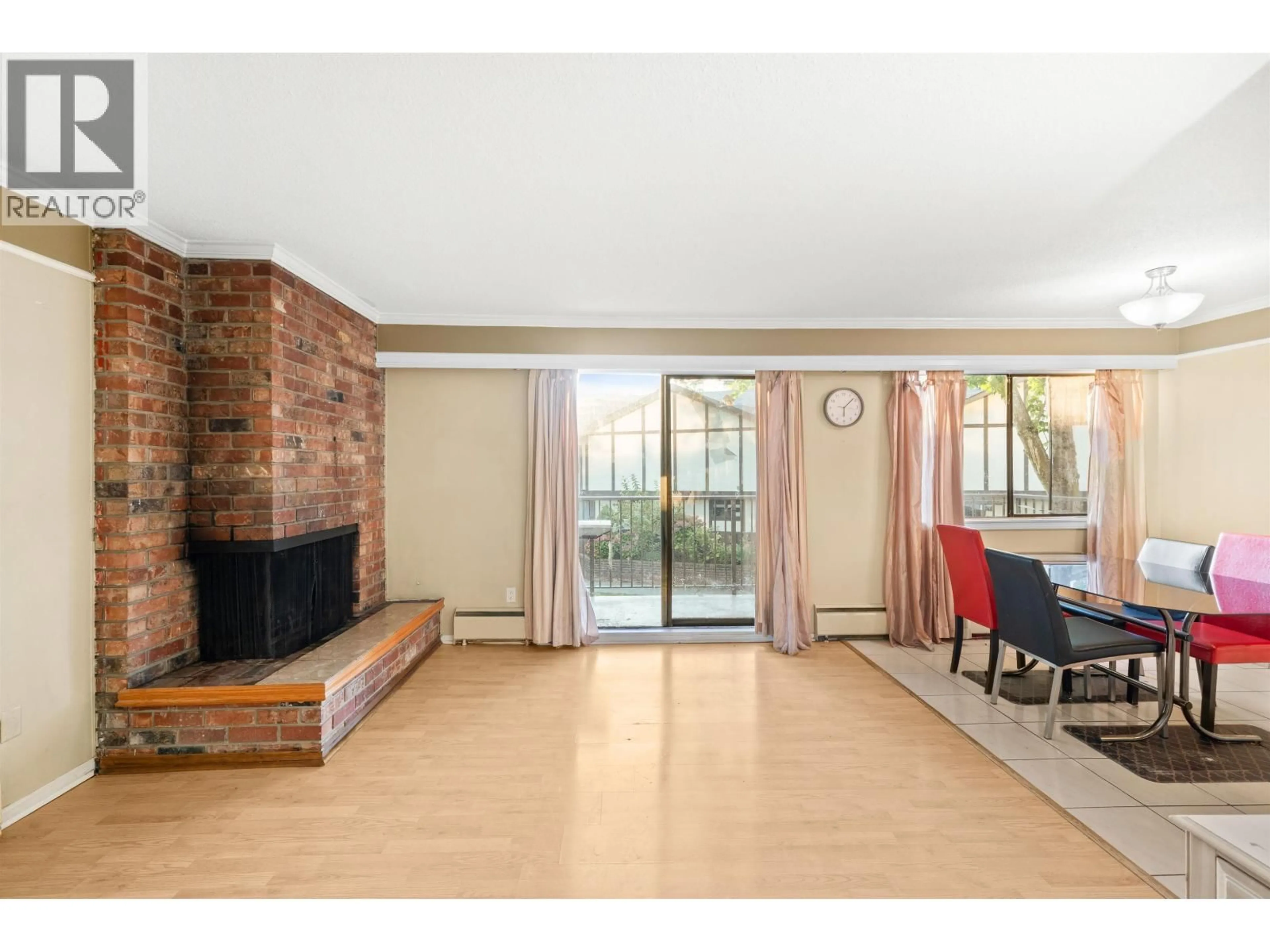 Living room with furniture, wood/laminate floor for 8985 HORNE STREET, Burnaby British Columbia V3N4J8