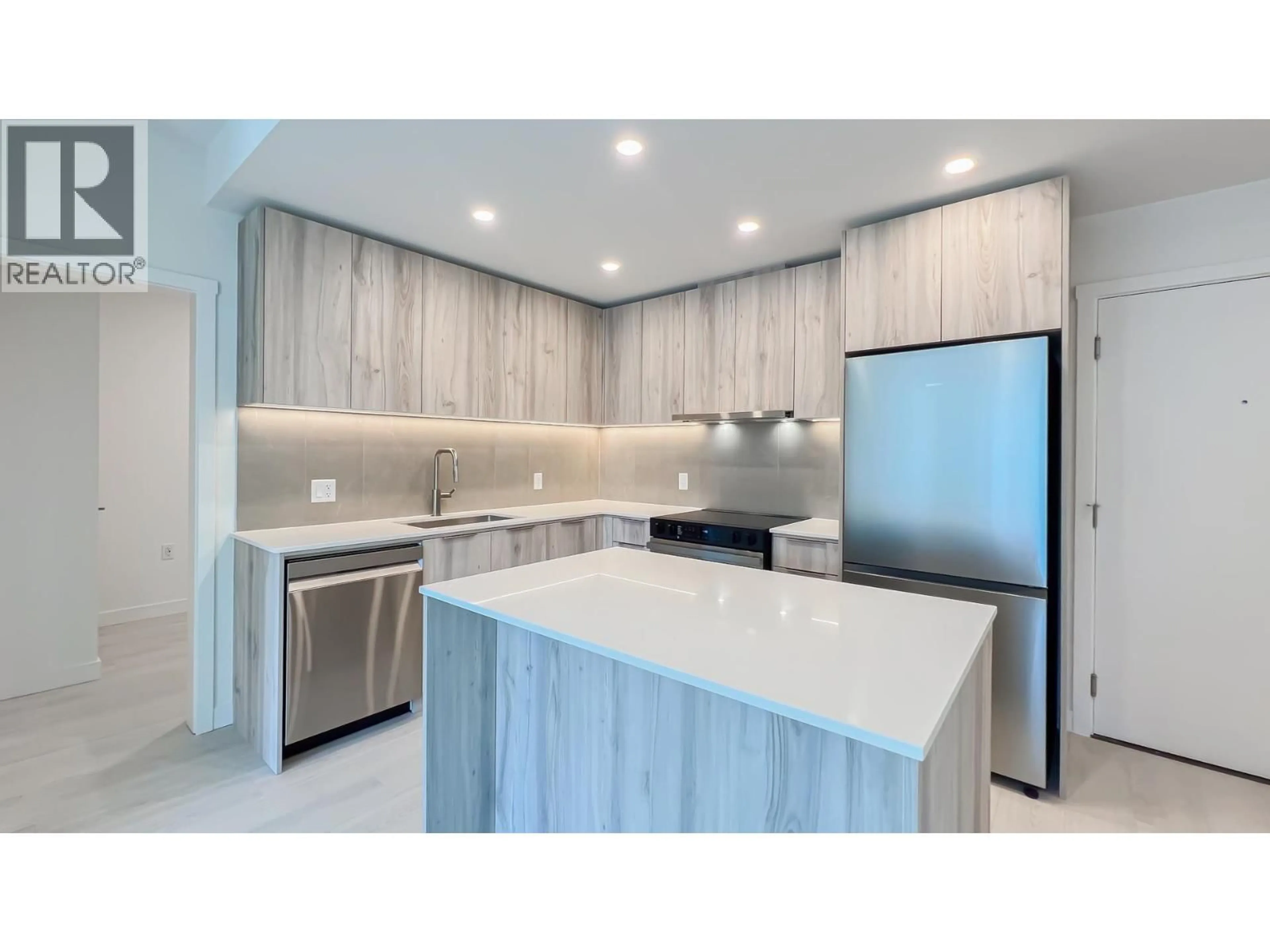 Open concept kitchen, unknown for 422 - 3594 MALSUM DRIVE, North Vancouver British Columbia V7G0B4
