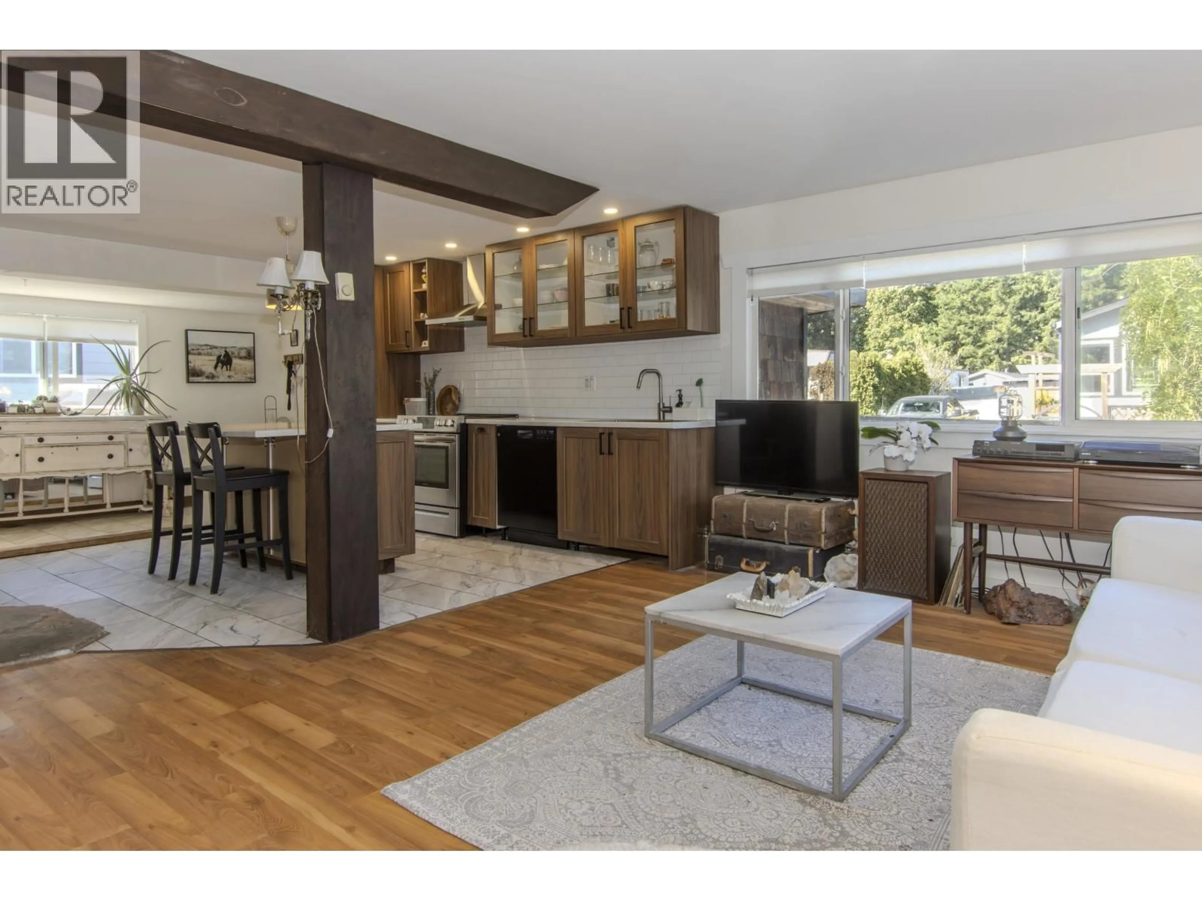 Open concept kitchen, wood/laminate floor for 76 - 40157 GOVERNMENT ROAD, Squamish British Columbia V0N1T0