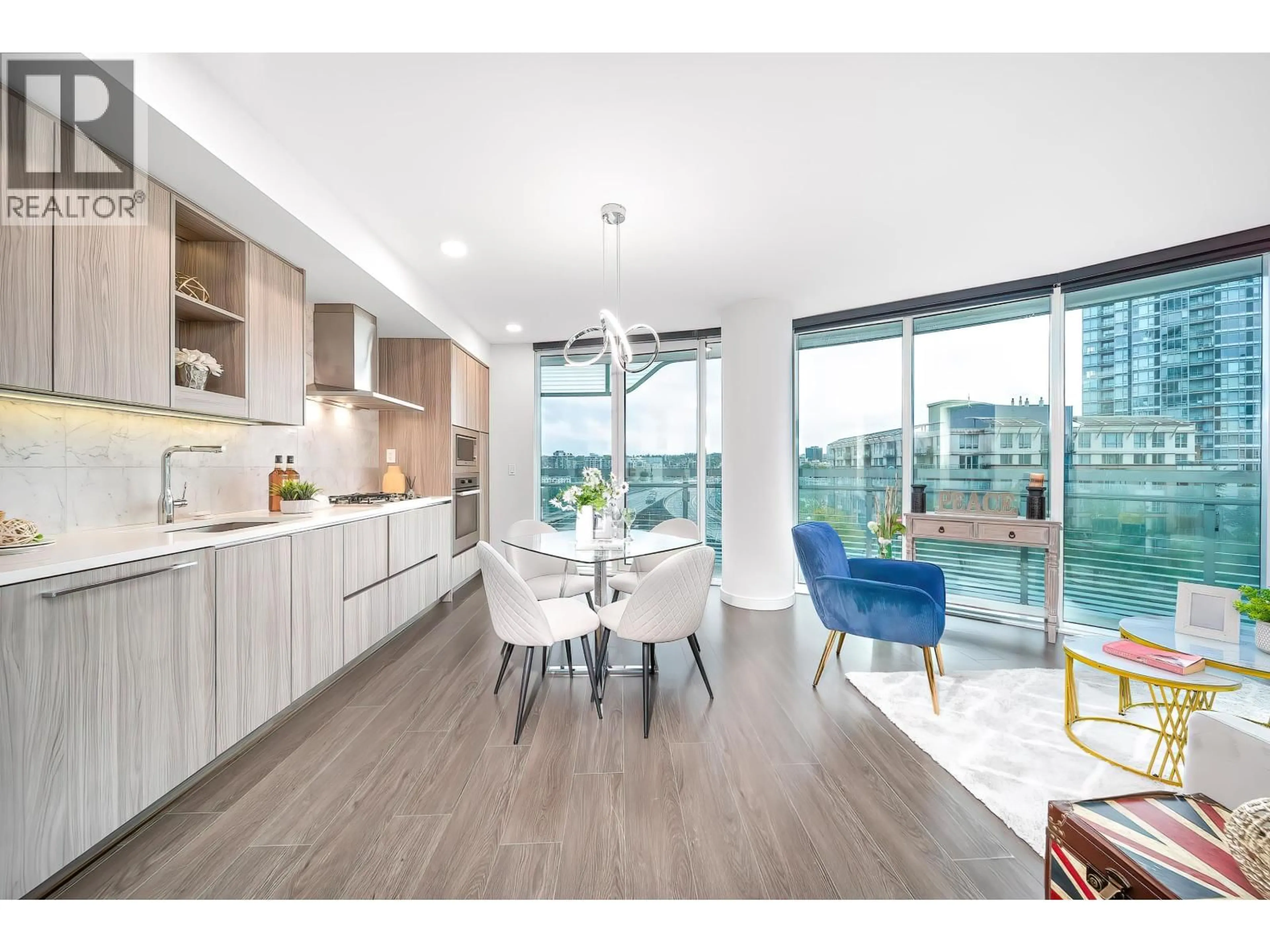 Open concept kitchen, wood/laminate floor for 785 - 87 NELSON STREET, Vancouver British Columbia V6Z0E8