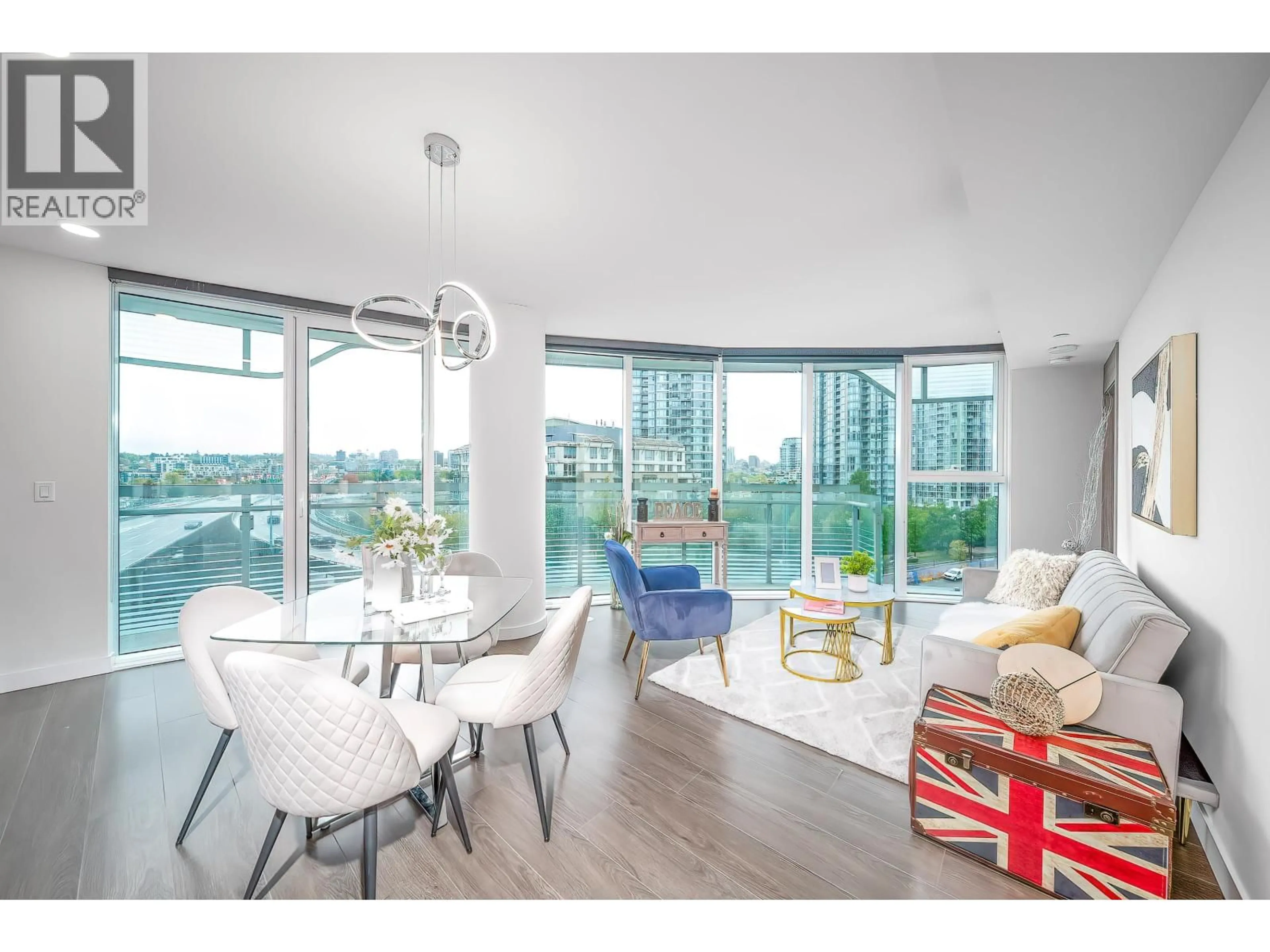 Living room with furniture, wood/laminate floor for 785 - 87 NELSON STREET, Vancouver British Columbia V6Z0E8
