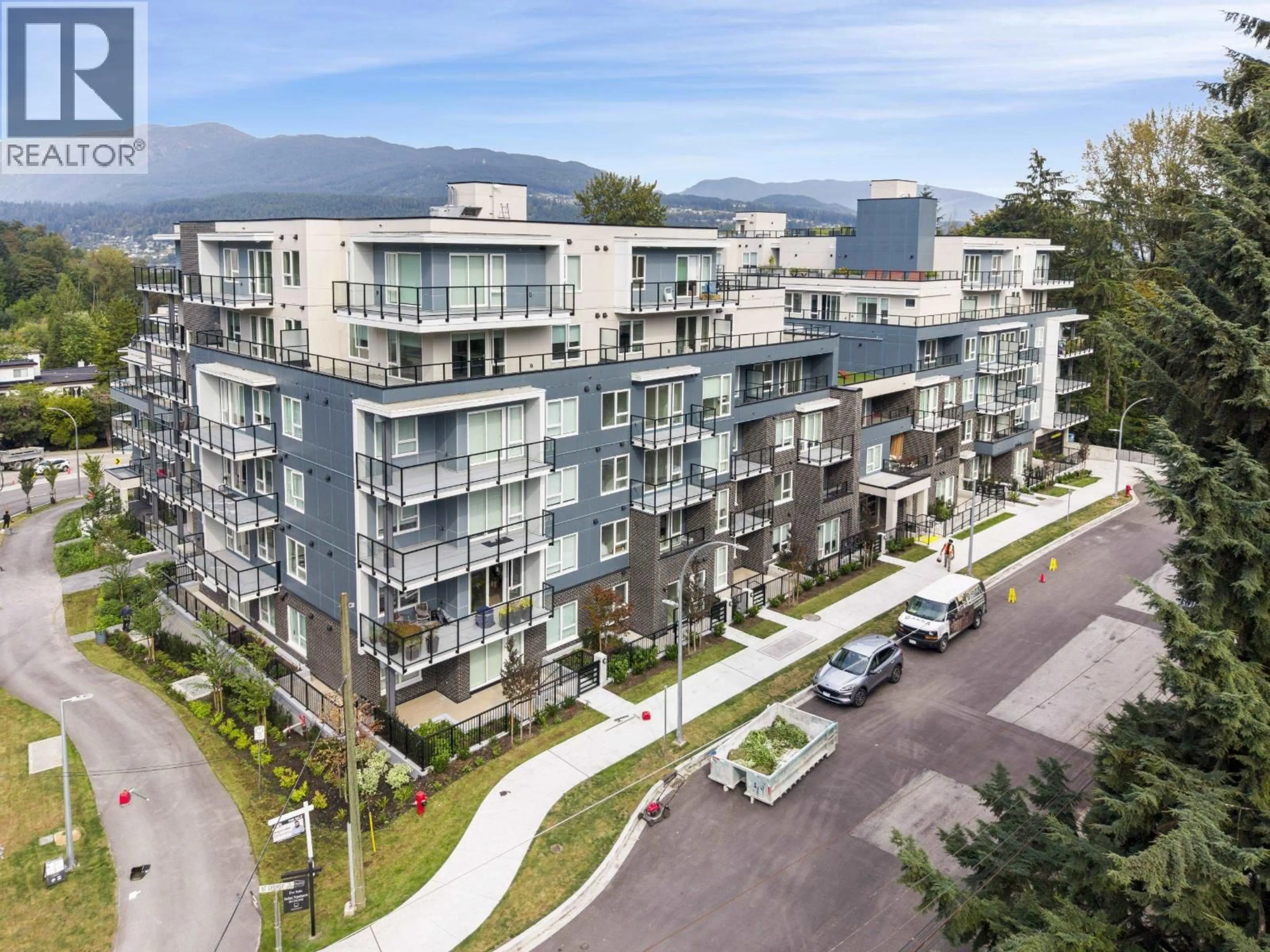 A pic from outside/outdoor area/front of a property/back of a property/a pic from drone, mountain view for 410 - 2002 ST. GEORGE STREET, Port Moody British Columbia V3H2E6